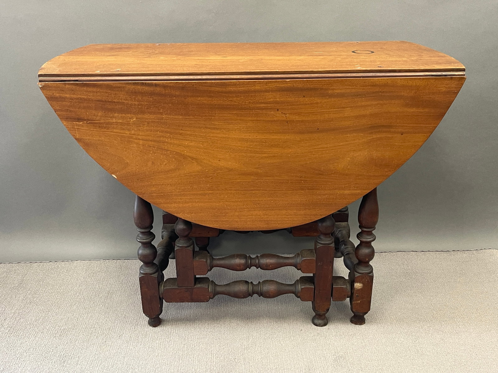 BOLDLY TURNED WALNUT GATELEG TABLE - 3