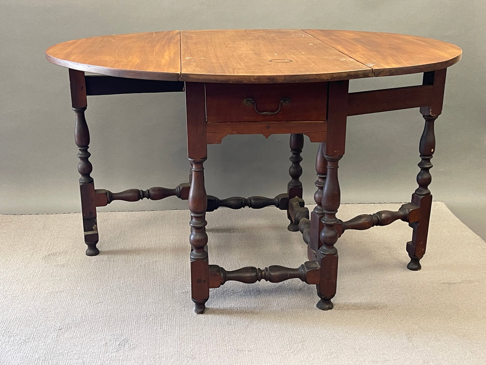 BOLDLY TURNED WALNUT GATELEG TABLE - 6