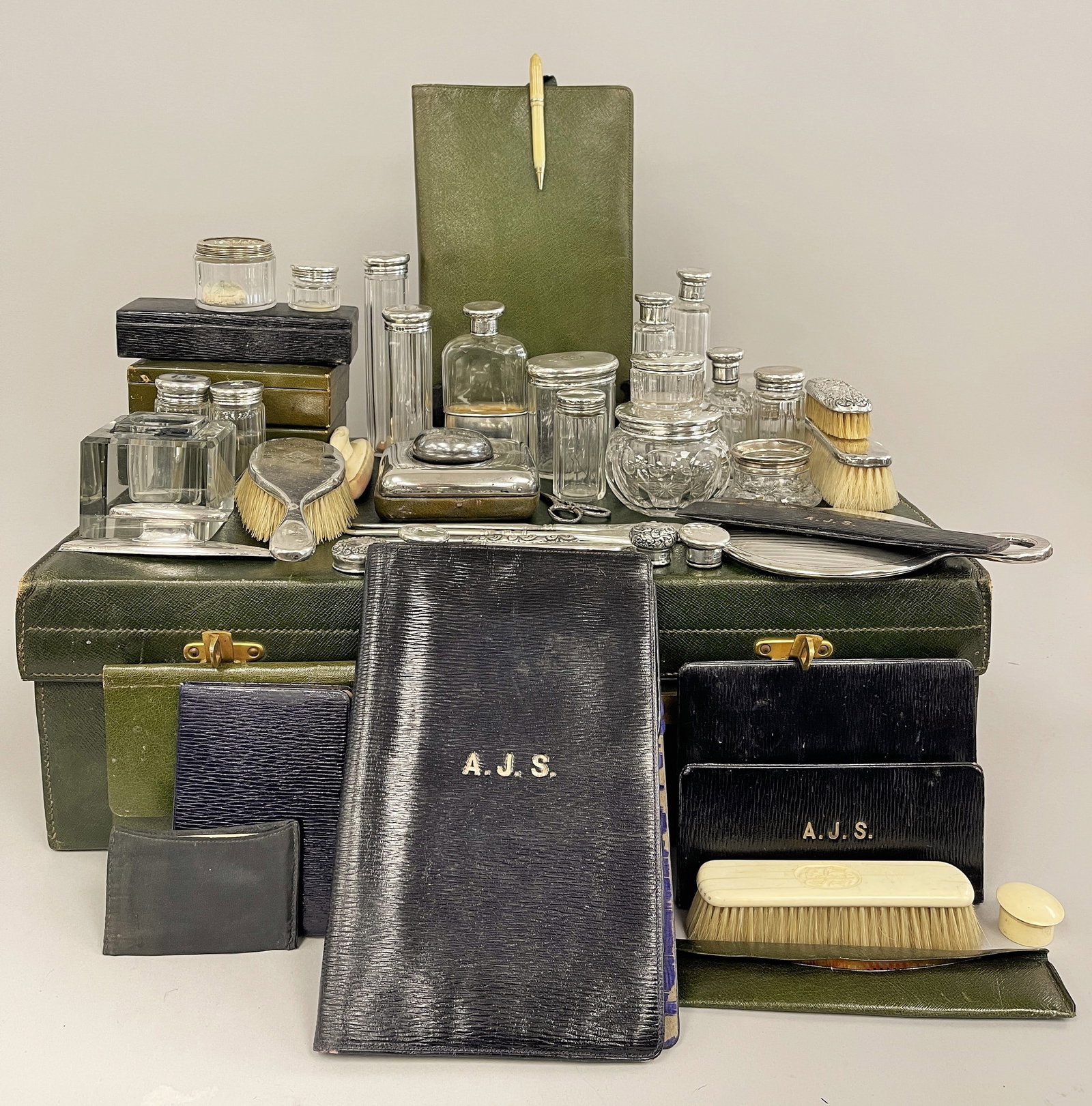 LARGE GROUPING OF TRAVEL BOTTLES, ITEMS: LARGE GROUPING OF TRAVEL BOTTLES,INKWELL, PODERS, COLOGNE MOST WITH STERLING CAPS OR HALLMARKS