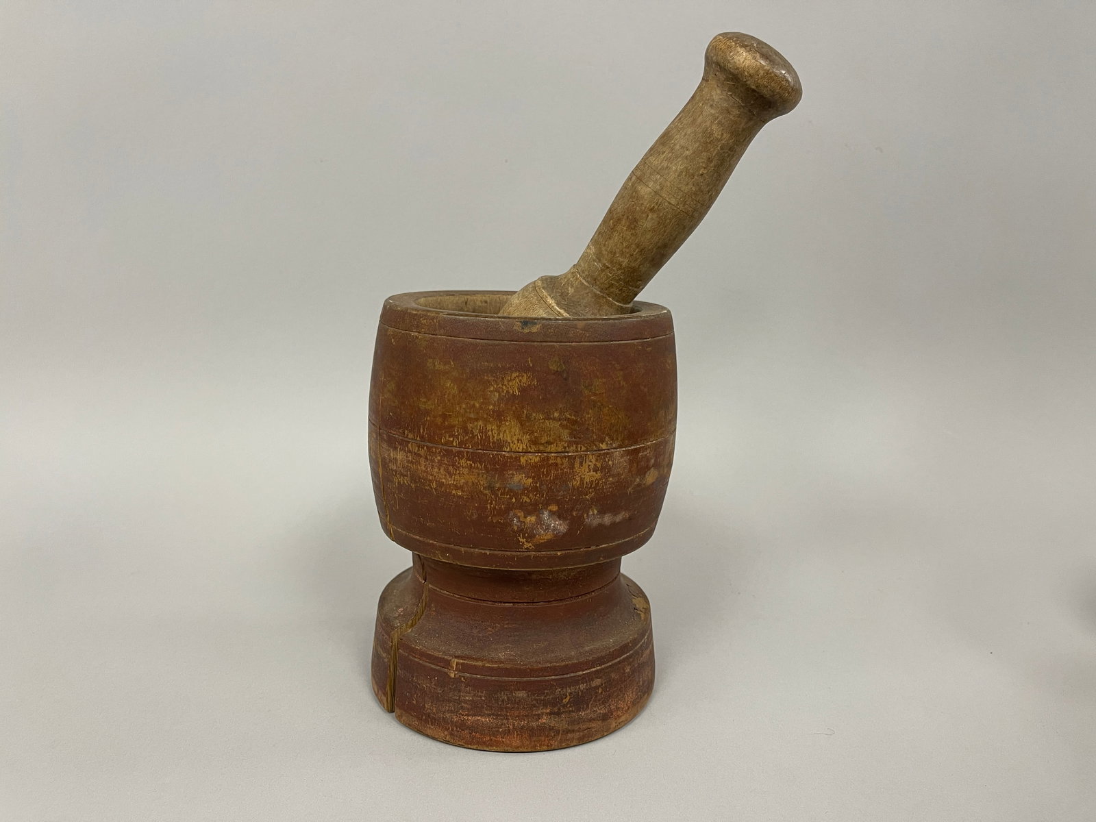 RED PAINTED MORTAR AND PESTLE: EARLY RED PAINTED MORTAR AND PESTLE