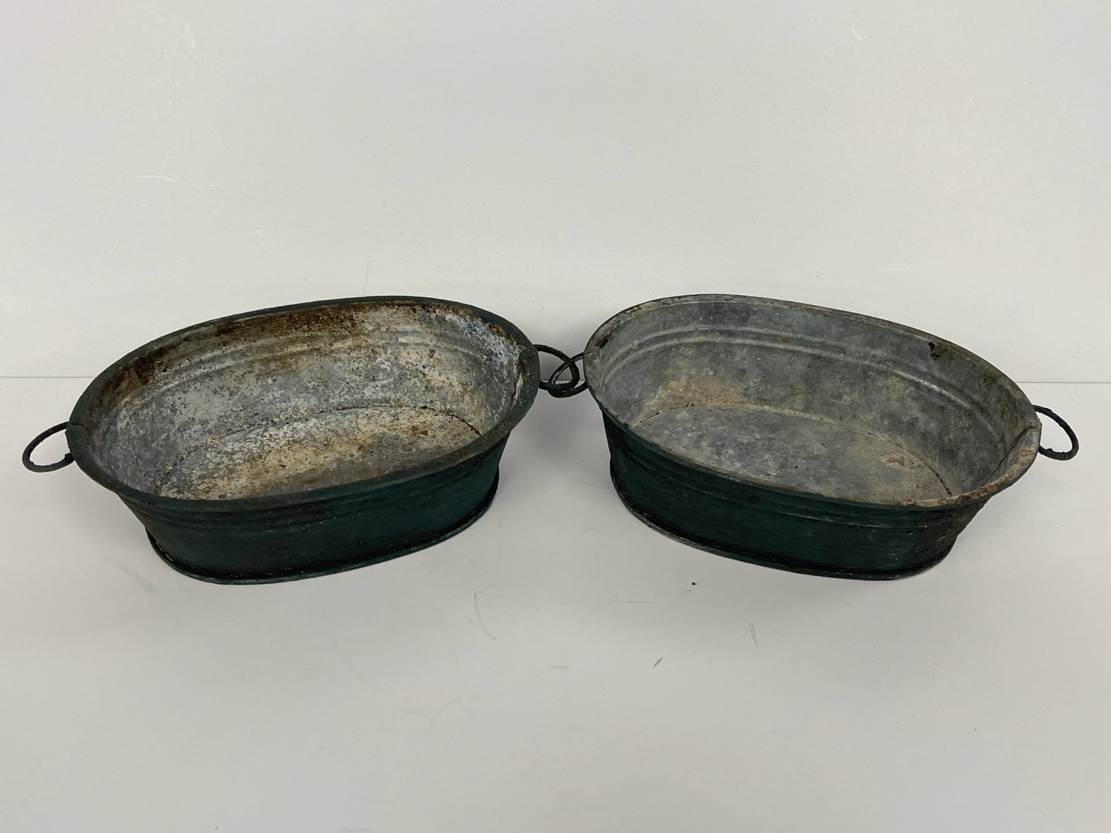 PAIR OF EARLY MINIATURE WASH TUBS: PAIR OF EARLY MINIATURE WASH TUBS IN GREEN W/ ORIGINAL WIRE HANDLES
