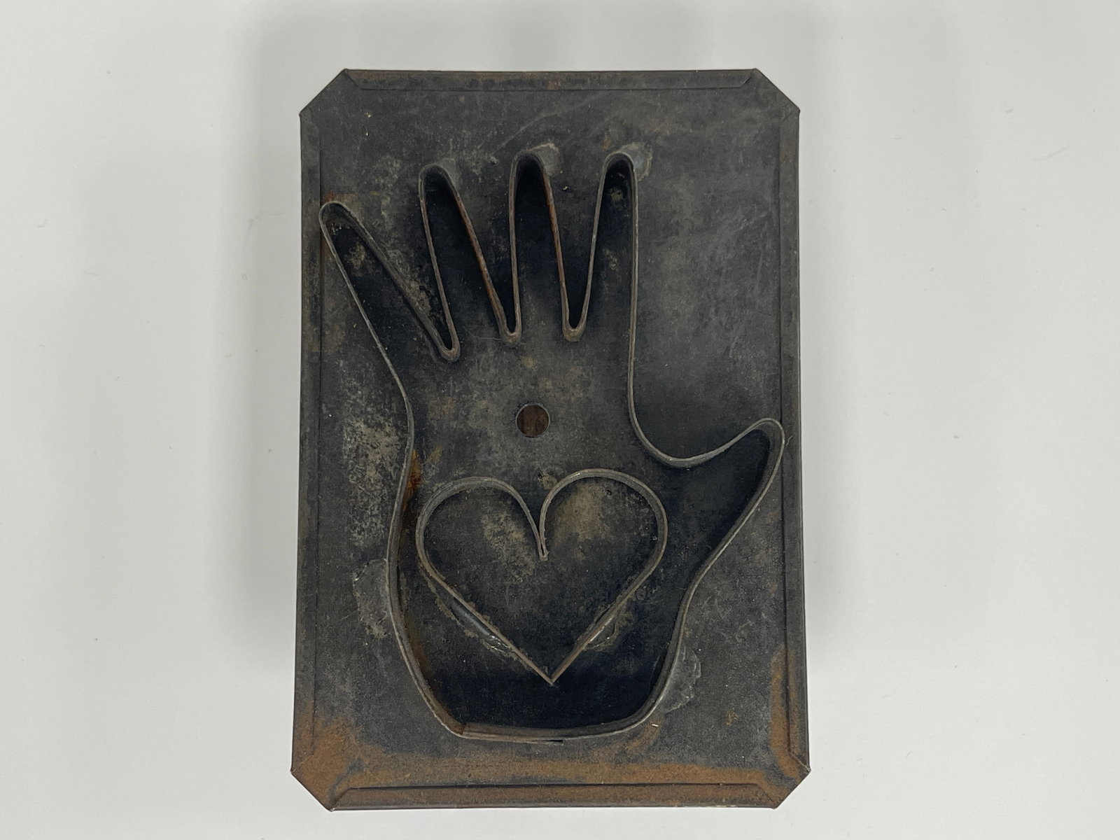 COOKIE CUTTER, HEART IN HAND (1 of 3)
