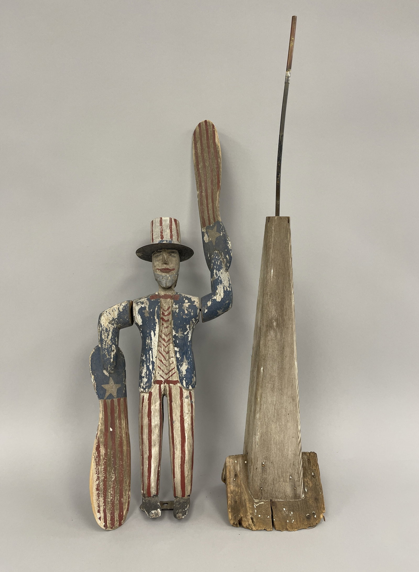 ICONIC UNCLE SAM WHIRLIGIG: ICONIC UNCLE SAM WHIRLIGIG SUPERB EXAMPLE, DRY COLORFUL ORIGINAL PAINT, EXPECTED WEAR, FULL BODY CARVED, SHEET IRON HAT BRIM, MID 19TH C, PROFESSIONAL BASE INCLUDED