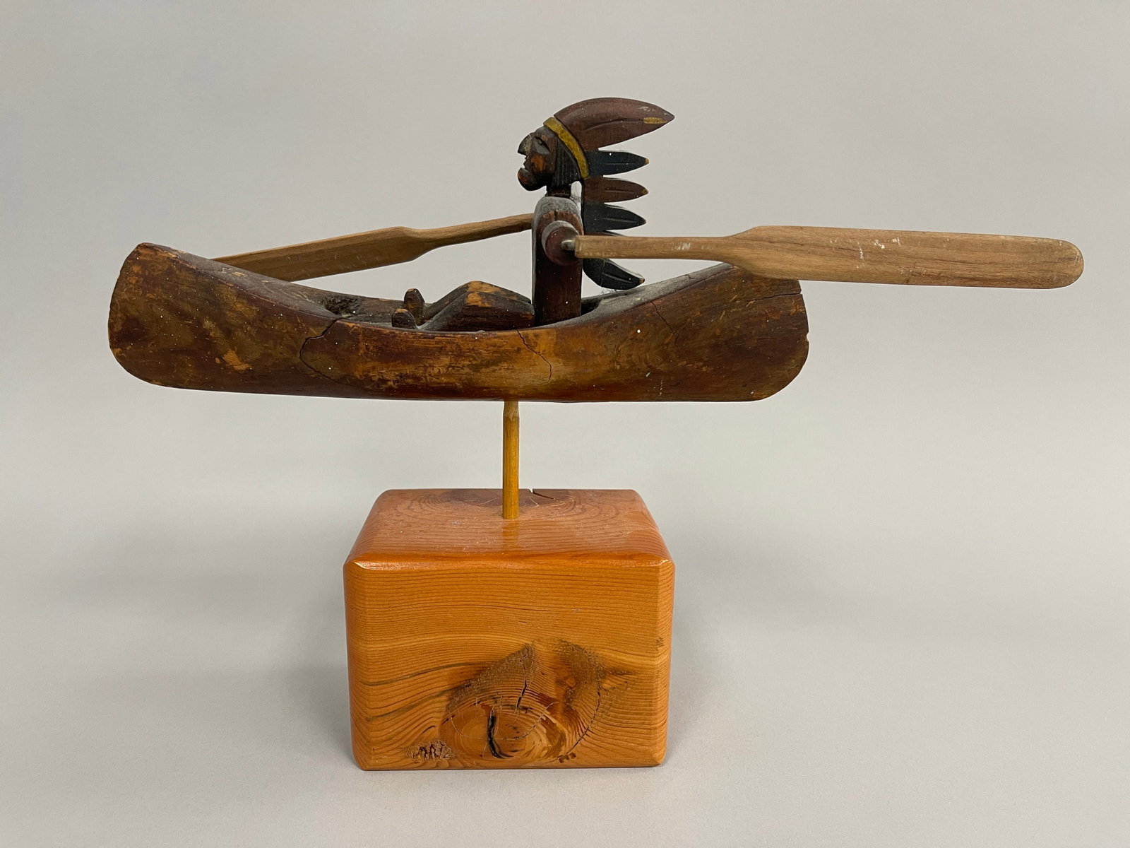 INDIAN CHIEF IN CANOE WHIRLIGIG: INDIAN CHIEF IN CANOE WHIRLIGIG LATE 19TH C, PINE, ORIGINAL PAINT, MODERN BASE, EXCELLENT CONDITION.