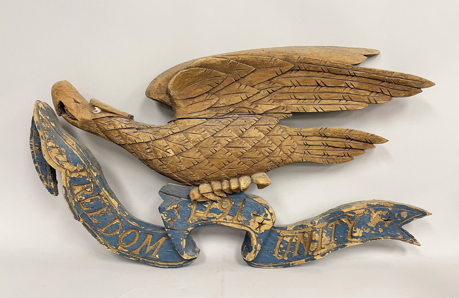 CARVED EAGLE PLAQUE: CARVED EAGLE PLAQUE 19TH C, PINE, ORIGINAL PAINT, MANNER OF JOHN BELLAMY, KITTERY, ME.