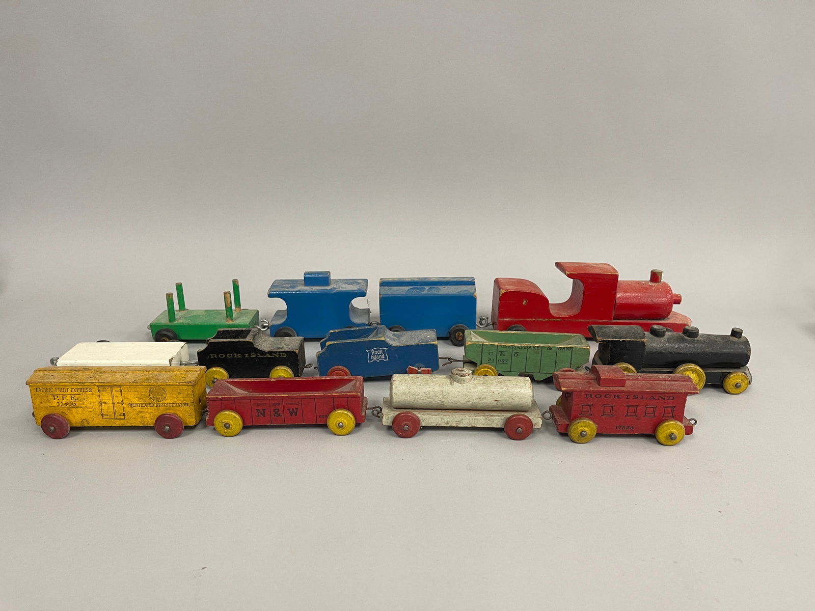 2 MINIATURE TOY TRAINS (1 of 4)