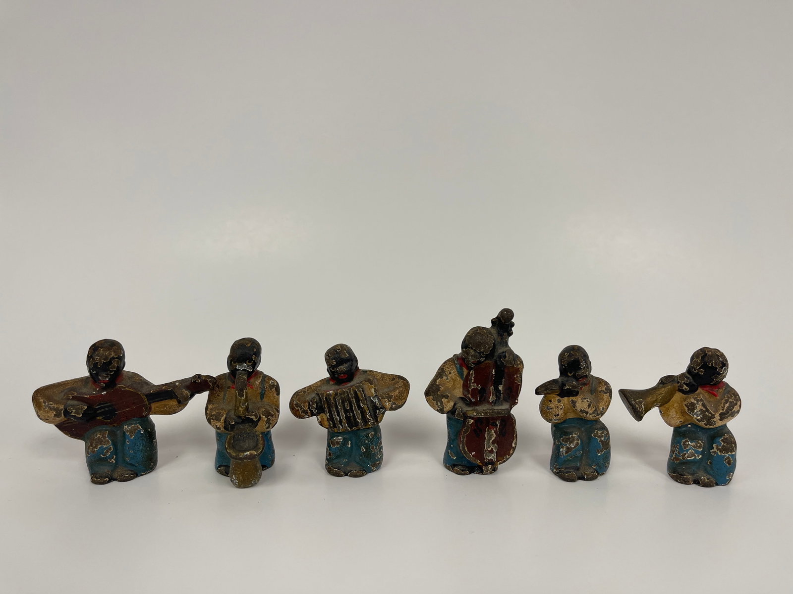 RARE CAST IRON MINSTREL GROUP: RARE CAST IRON MINSTREL GROUP LATE 19TH C, GROUP OF FIVE, EXPECTED PAINT WEAR, OVERALL EXCELLENT CONDITION
