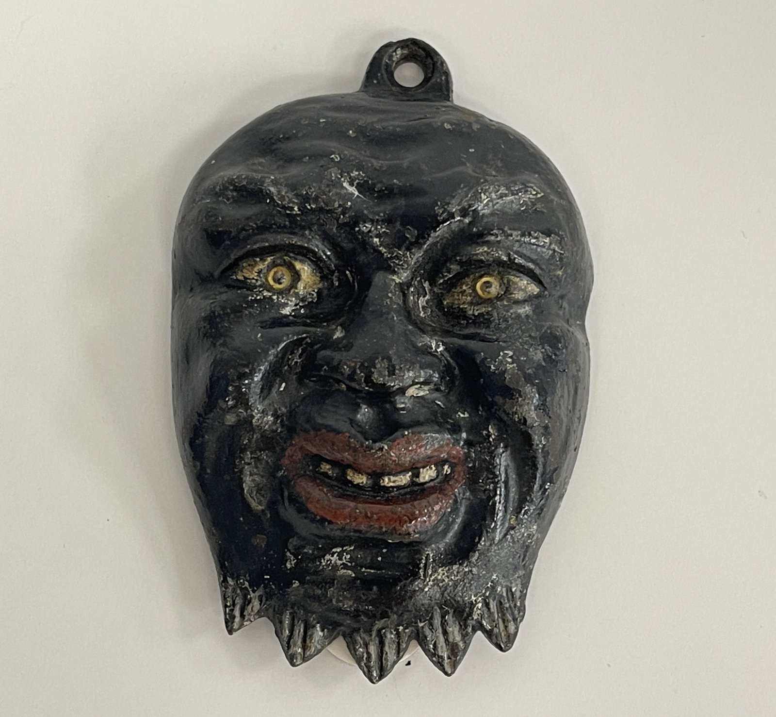 SMALL BLACK FACE PLAQUE: SMALL BLACK FACE PLAQUE LATE 19TH C, CAST IRON, ORIGINAL PAINT, EXCELLENT CONDITION.
