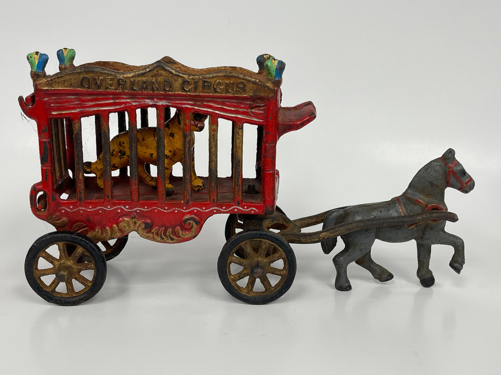 OVERLAND CIRCUS WAGON TOY: OVERLAND CIRCUS WAGON TOY LATE 19TH C, CAST IRON, EXCELLENT CONDITION.