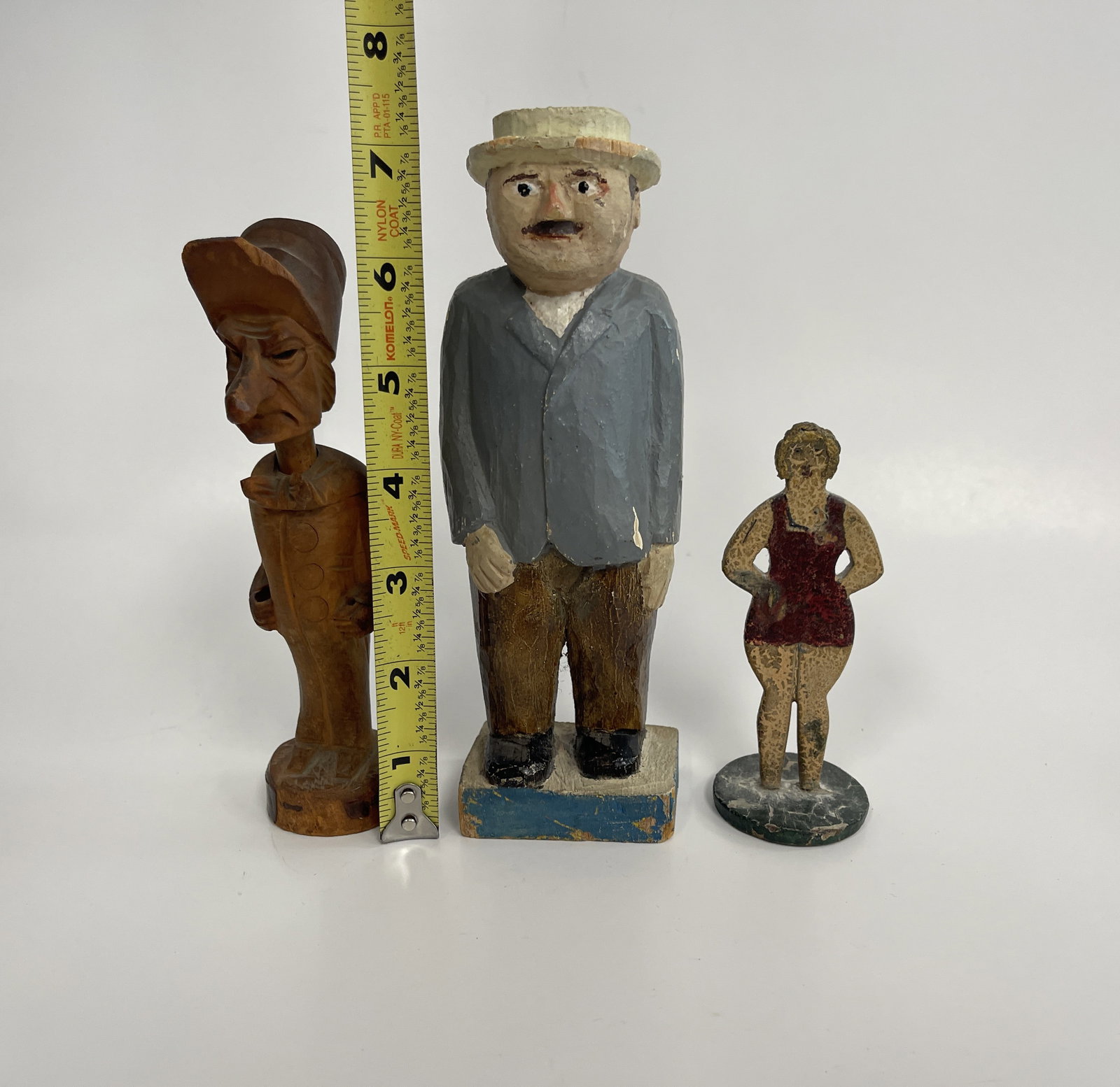 3 CARVED FIGURES - 3
