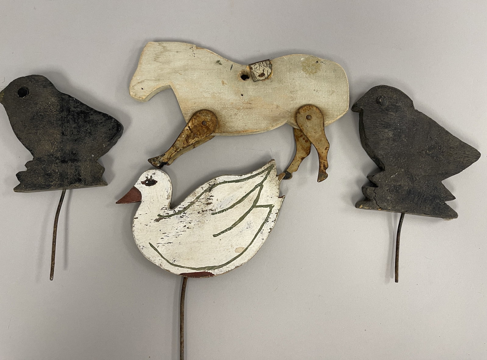 4 FLAT CARVED ANIMALS - 2