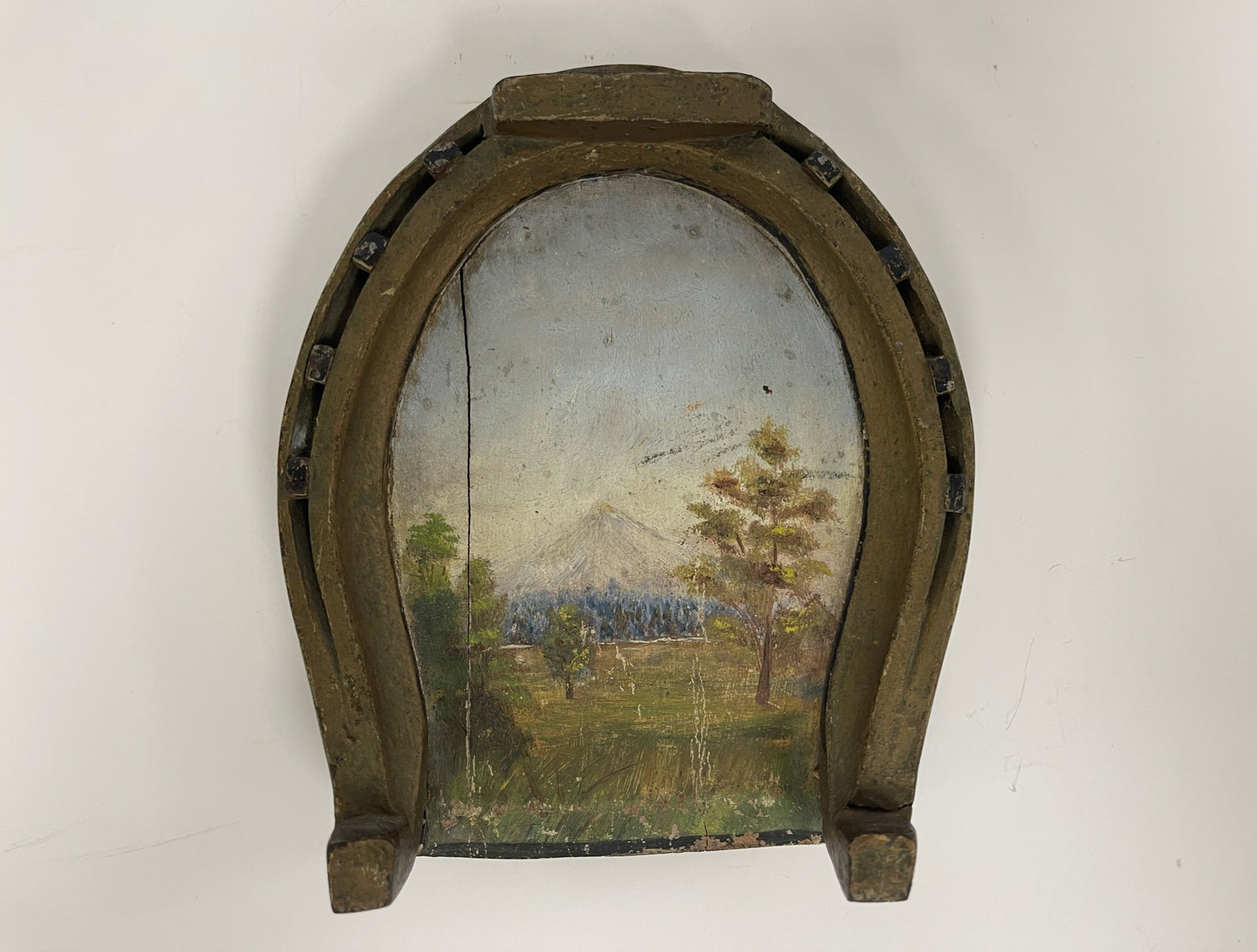 HORSESHOE FRAMED LANDSCAPE PAINTING: HORSESHOE FRAMED LANDSCAPE PAINTING LATE 19TH C, IRON & WOOD, EXCELLENT CONDITION.