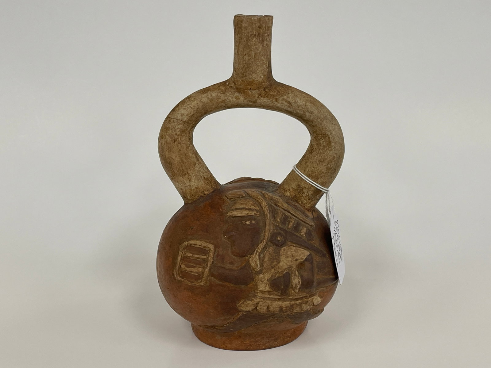 MOCHE STIRRUP VESSEL WITH HUNTER: MOCHE STIRRUP VESSEL WITH HUNTER