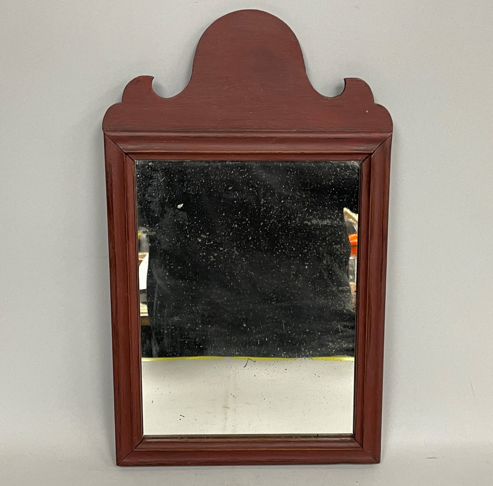 FINE SMALL QA MIRROR C 1720-50: FINE SMALL QA MIRROR C 1720-50, NEW ENGLAND. WALNUT, PINE BACKBOARD, EARLY RED OVER ORIGINAL BLACK PAINT, EXPECTED MINOR SILVERING LOSS TO GLASS. EXCELLENT CONDITION.
