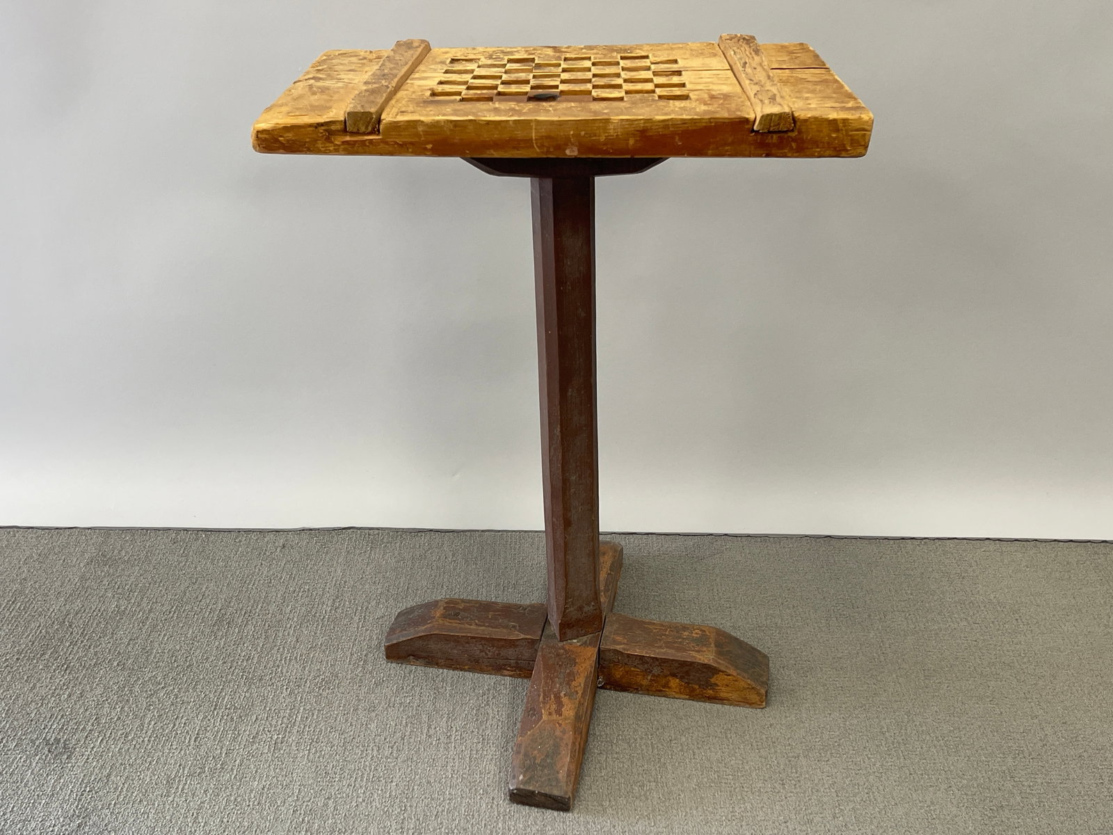 17TH C AMERICAN X-BASE CANDLE STAND IN ORIGINAL RED PAINT WITH CARVED CHESS BOARD TOP: 17TH C AMERICAN X-BASE CANDLE STAND IN ORIGINAL RED PAINT WITH CARVED CHESS BOARD TOP 1680-1700 PLYMOUTH COUNTY MA MAPLE AND PINE12 X 18 X 25