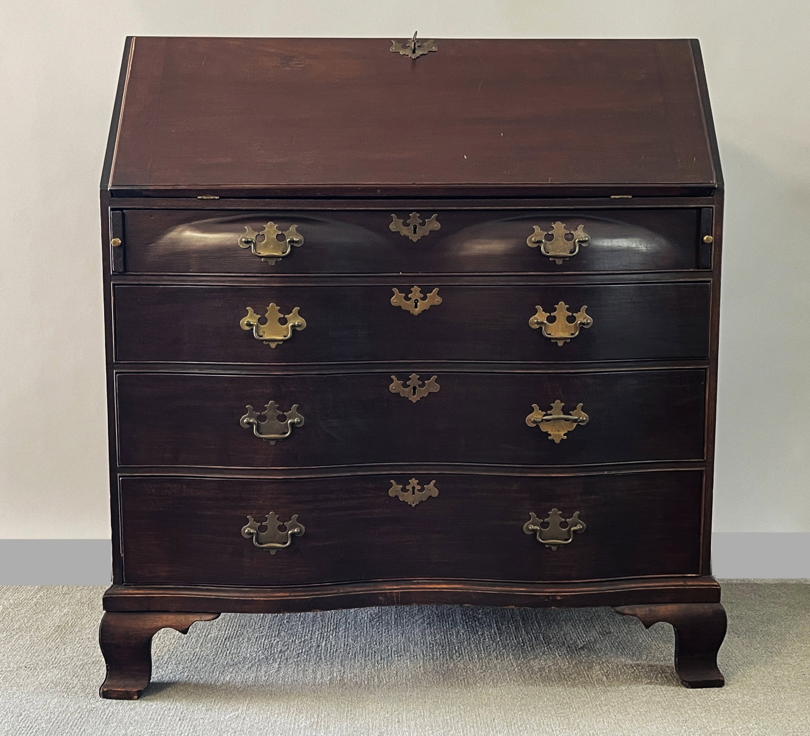 CHIPPENDALE SERPENTINE SLANT FRONT DESK IN OLD SURFACE: CHIPPENDALE SERPENTINE SLANT FRONT DESK IN OLD SURFACE
