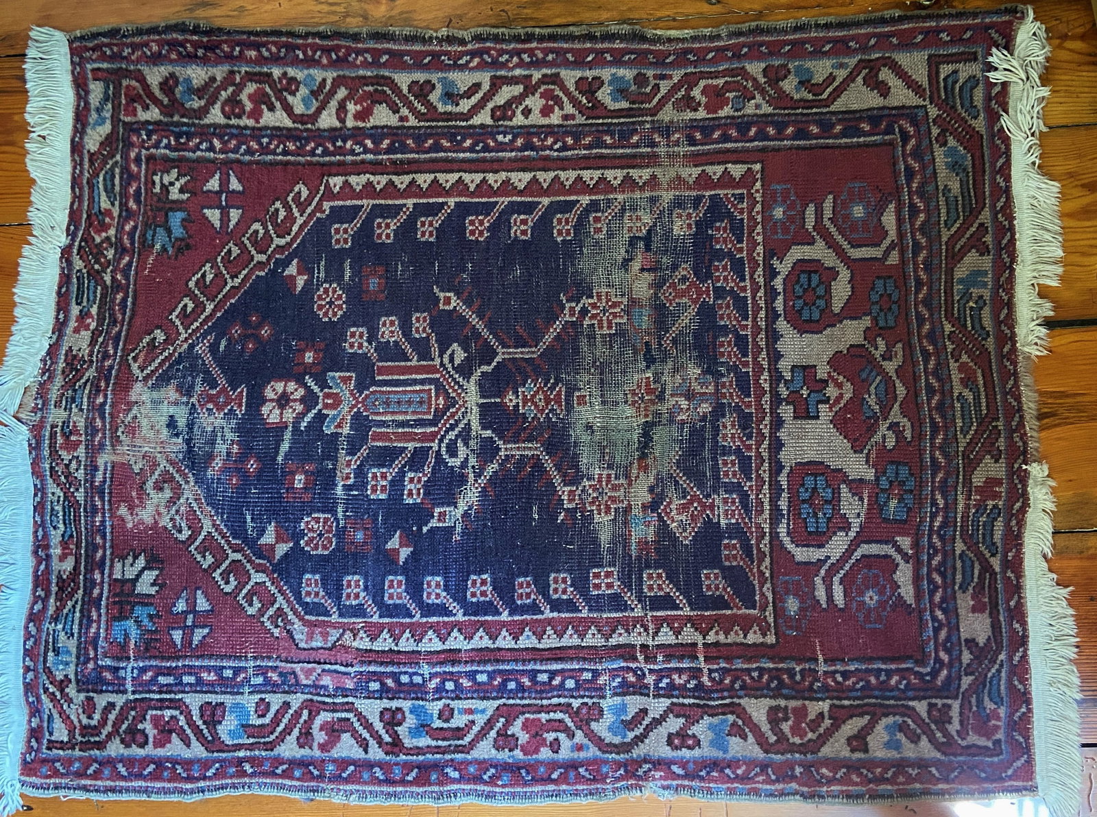 SMALL WOOL RUG (1 of 2)