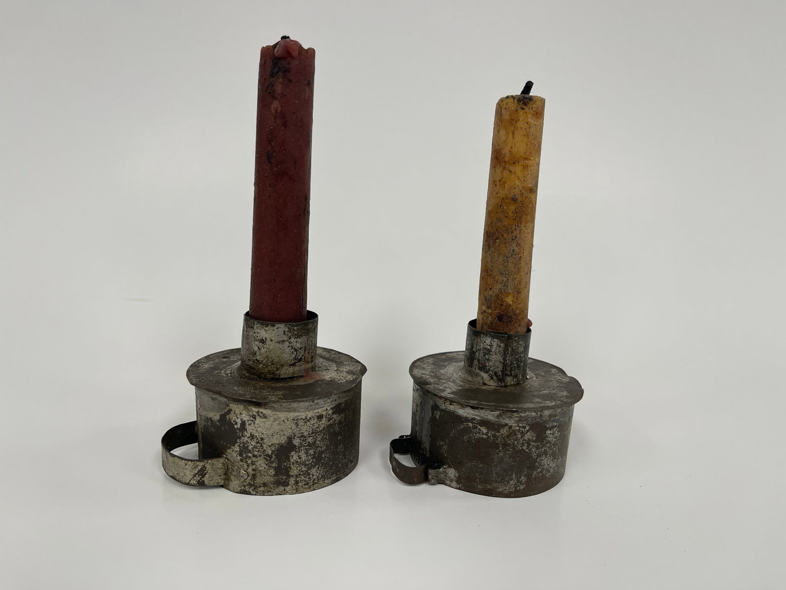 TWO MINIATURE SHEET TIN CANDLE CUPS (1 of 2)