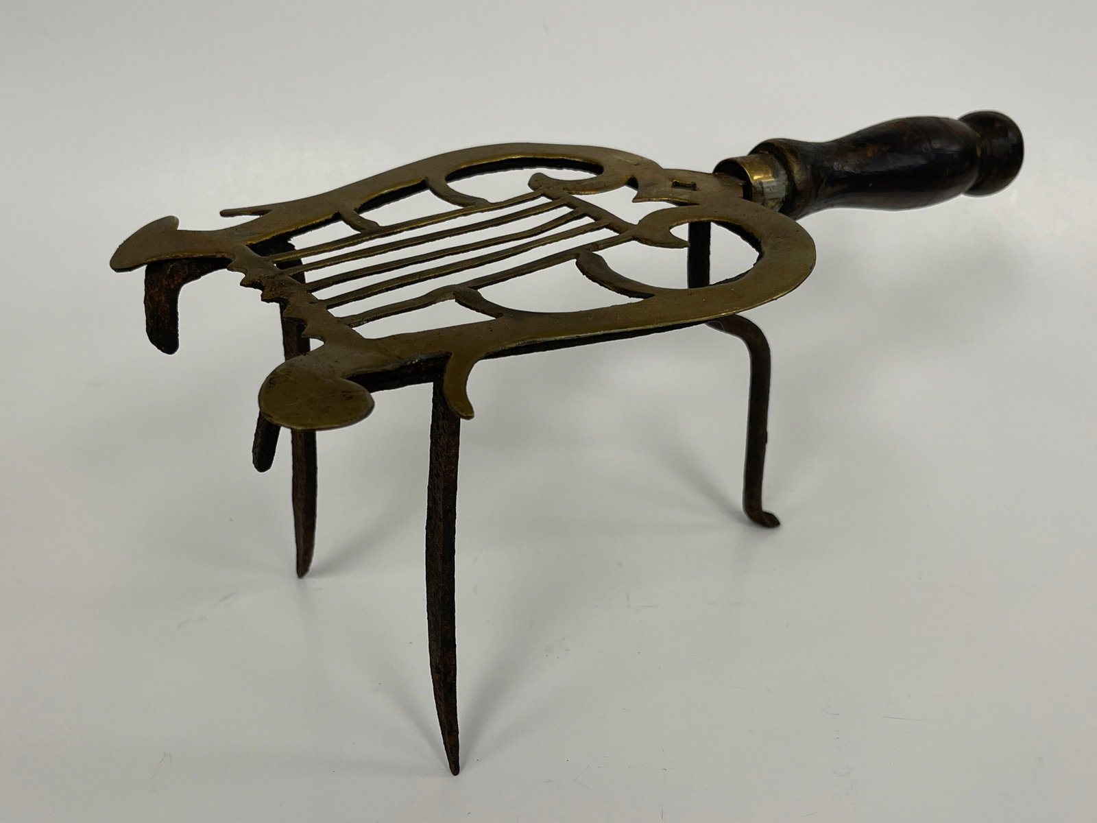 18TH C BRASS AND IRON HEARTH TRIVET (1 of 4)