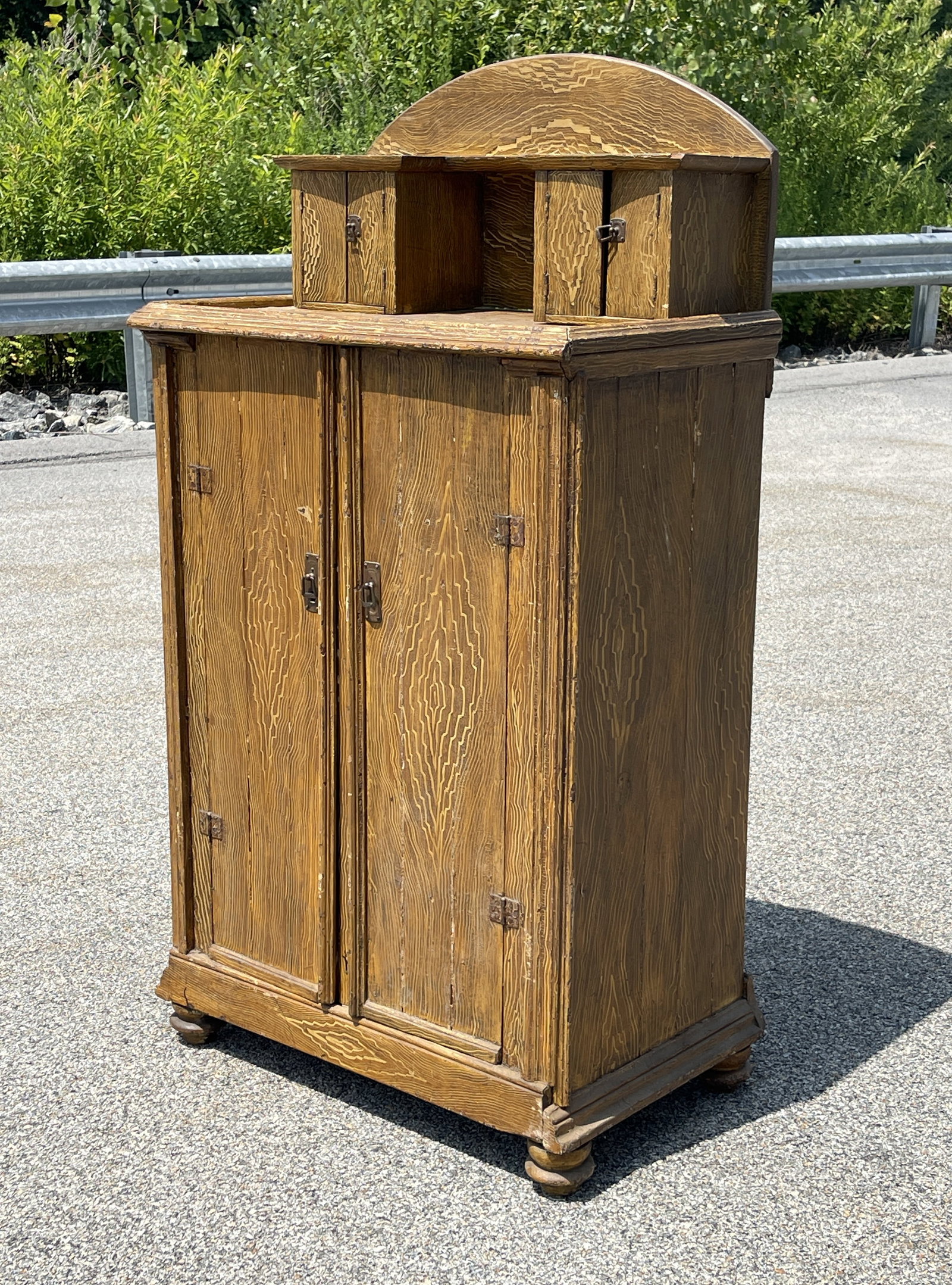 GRAIN PAINTED TWO DOOR CUPBOARD: GRAIN PAINTED TWO DOOR CUPBOARD WITH BANK OF DOORS AT TOP, 34 X 18 X 60