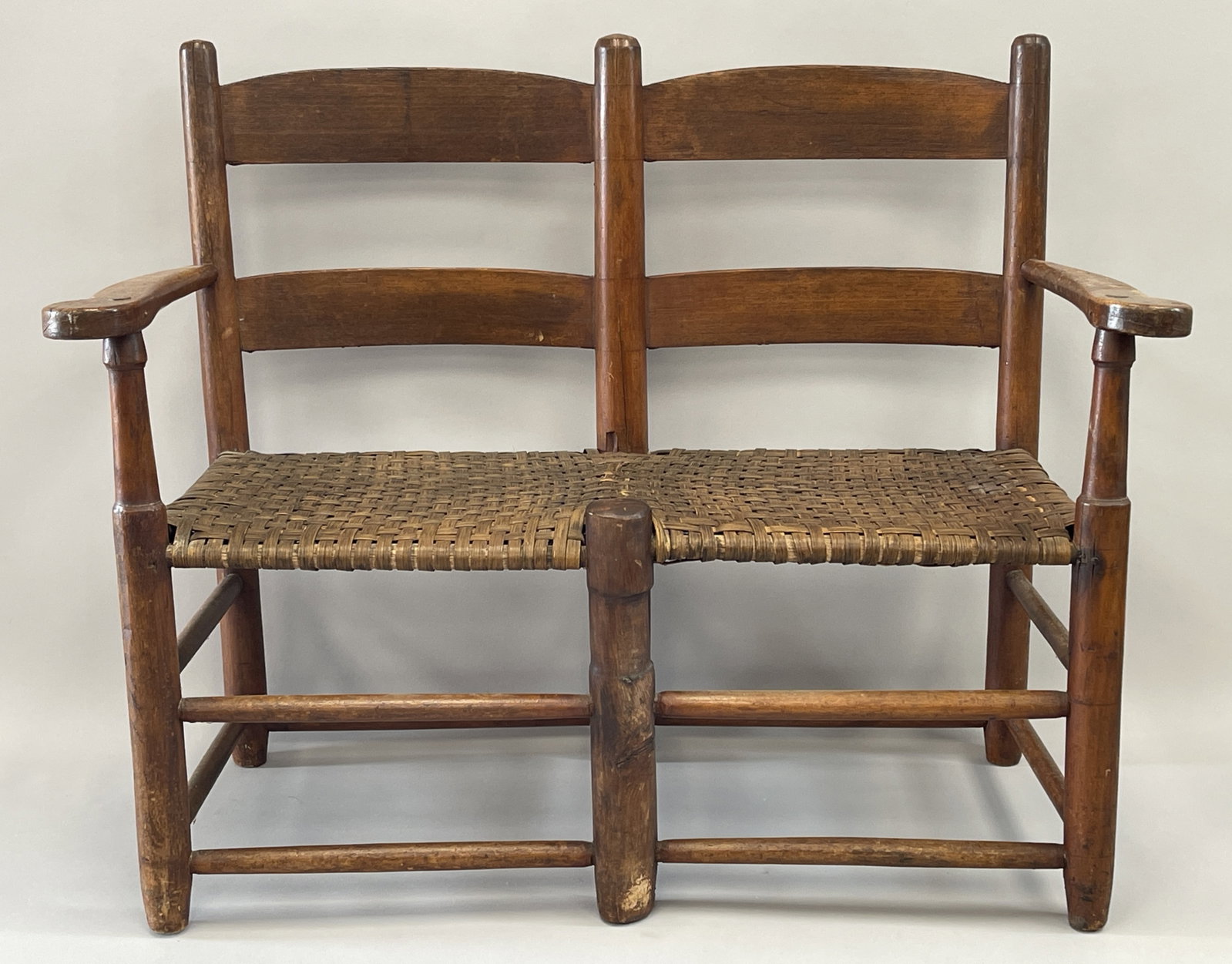EARLY DOUBLE SEATED WAGON BENCH: EARLY DOUBLE SEATED WAGON BENCH, GREAT ORIGINAL COLOR AND PATINS, SCROLLED ARMS, GOOD STRONG SEAT, 31 X 34 X 14