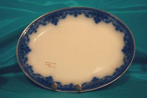 Flow blue platter: 13 ½" wide; maker: Gustasberg; pattern: Sultan; dated: 1914; no chips or cracks