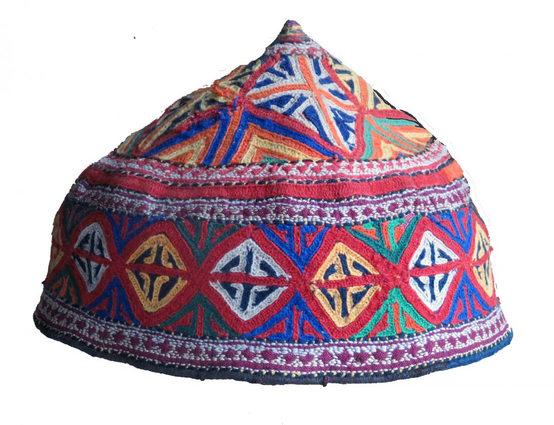 Quchan Kurd Embroidered Hat, NE Persia, circa 1920: An embroidered hat from the Kurdish people of Northeast Persia, living in the Quchan area of that region. The hat consist of silk embroidery on a cotton ground cloth. The condition is good with no hol
