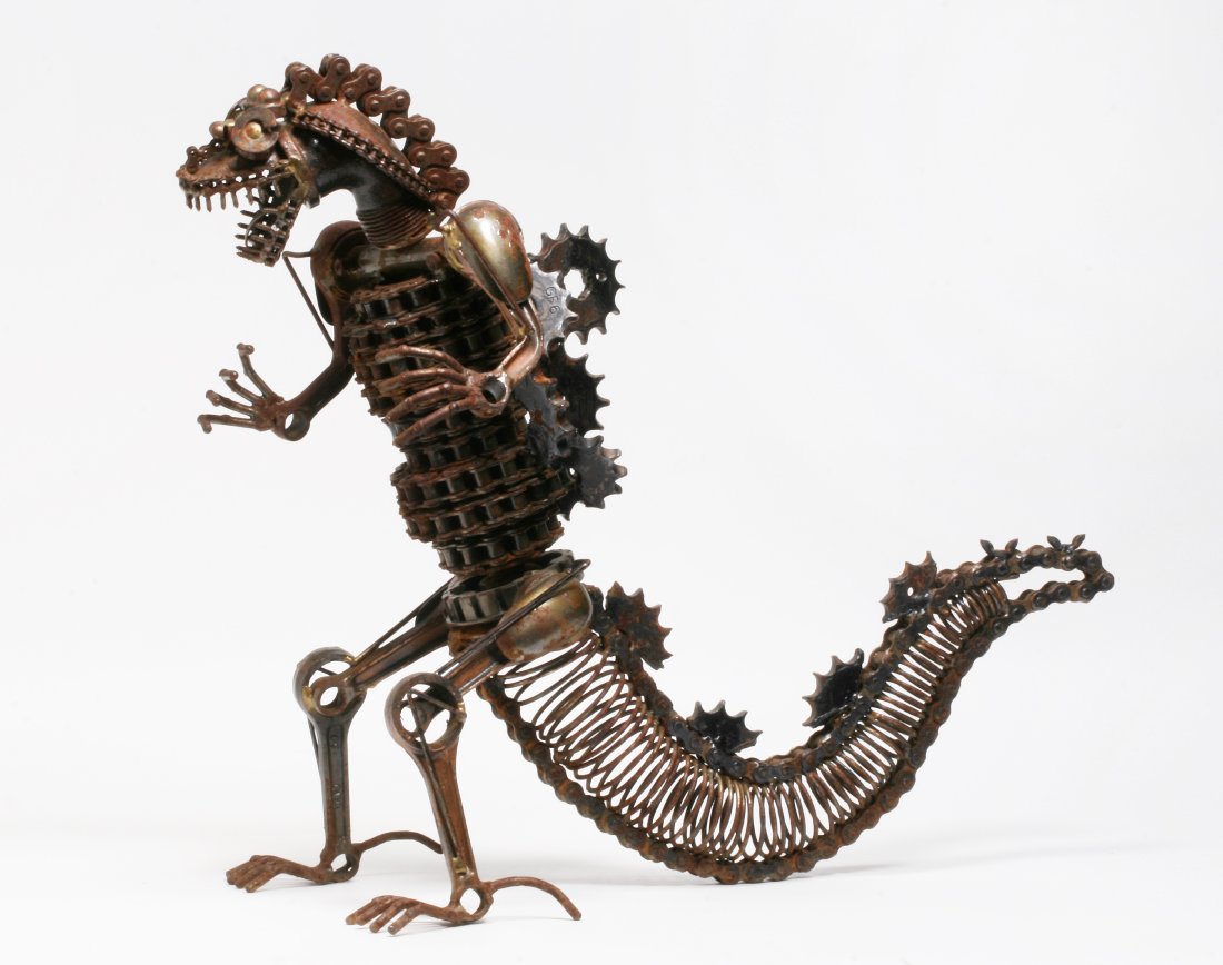Godzilla Brutalist Articulated Welded Steel Sculpture - 1970s: Industrial Brutalist 20th Century Moving parts include: the head, the tail, both arms separately and the legs together. Handmade by a creative and talented unknown American metal artist. Unsigned. Cir