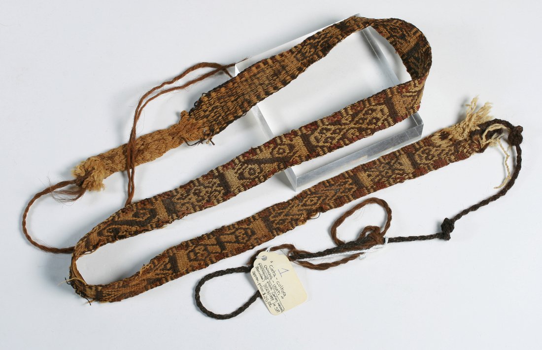 Pre-Columbian Chinca Culture Woven Textile Belt - Peru: Fine Pre-Columbian Chinca Culture woven textile belt. Highly decorated with different stylized animal designs in brown, beige and rust color in camelid wool. Collectors tag with information tied to a 