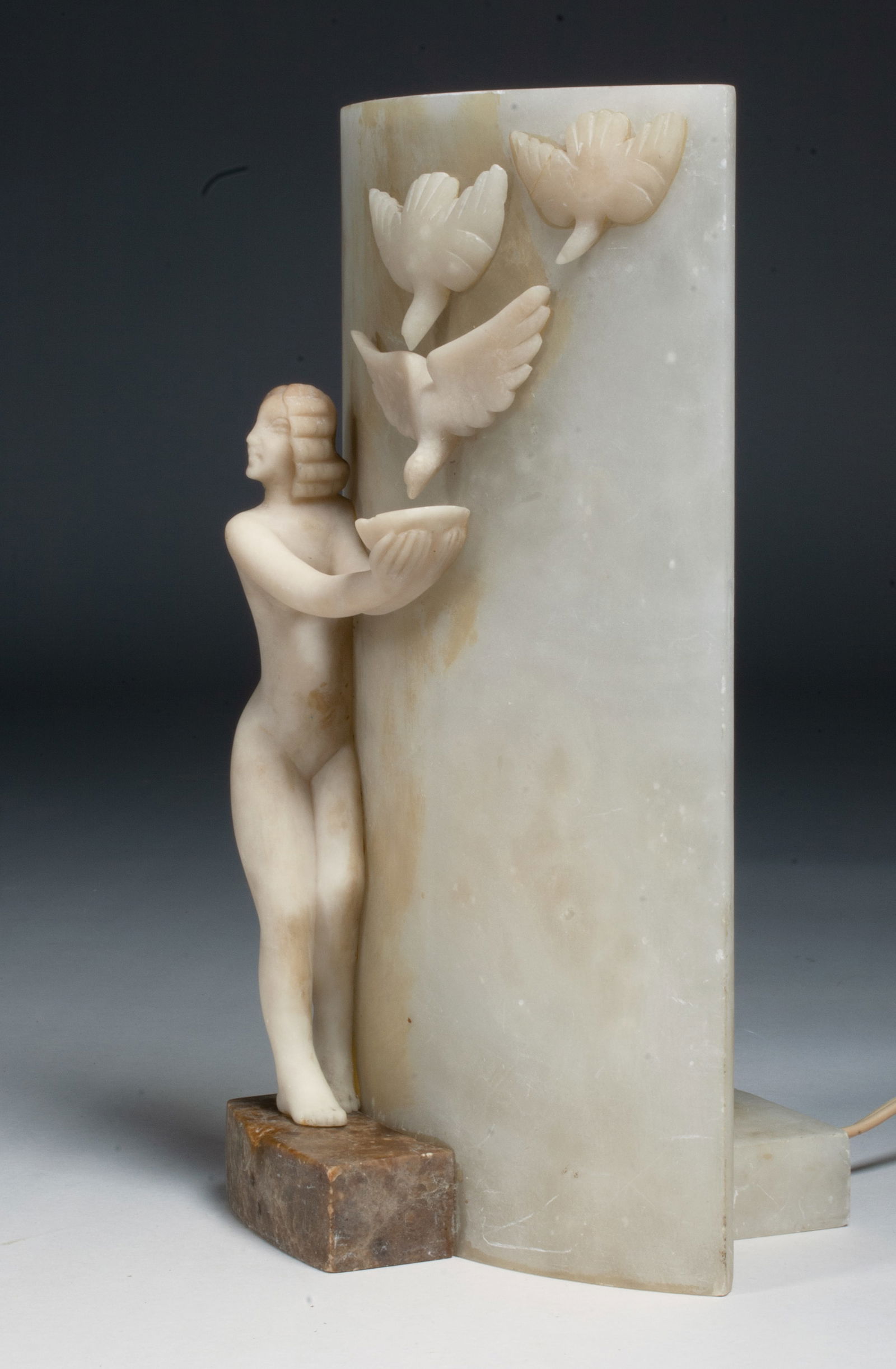 Italian Art Deco Lamp with Woman & Birds - Circa 1935: Fine Italian art deco alabaster bedside or accent lamp. Circa 1935. Inscribed into the alabaster base underside "402 ITALY". Featuring a curved, mottled white rectangular alabaster slab with a dimensi