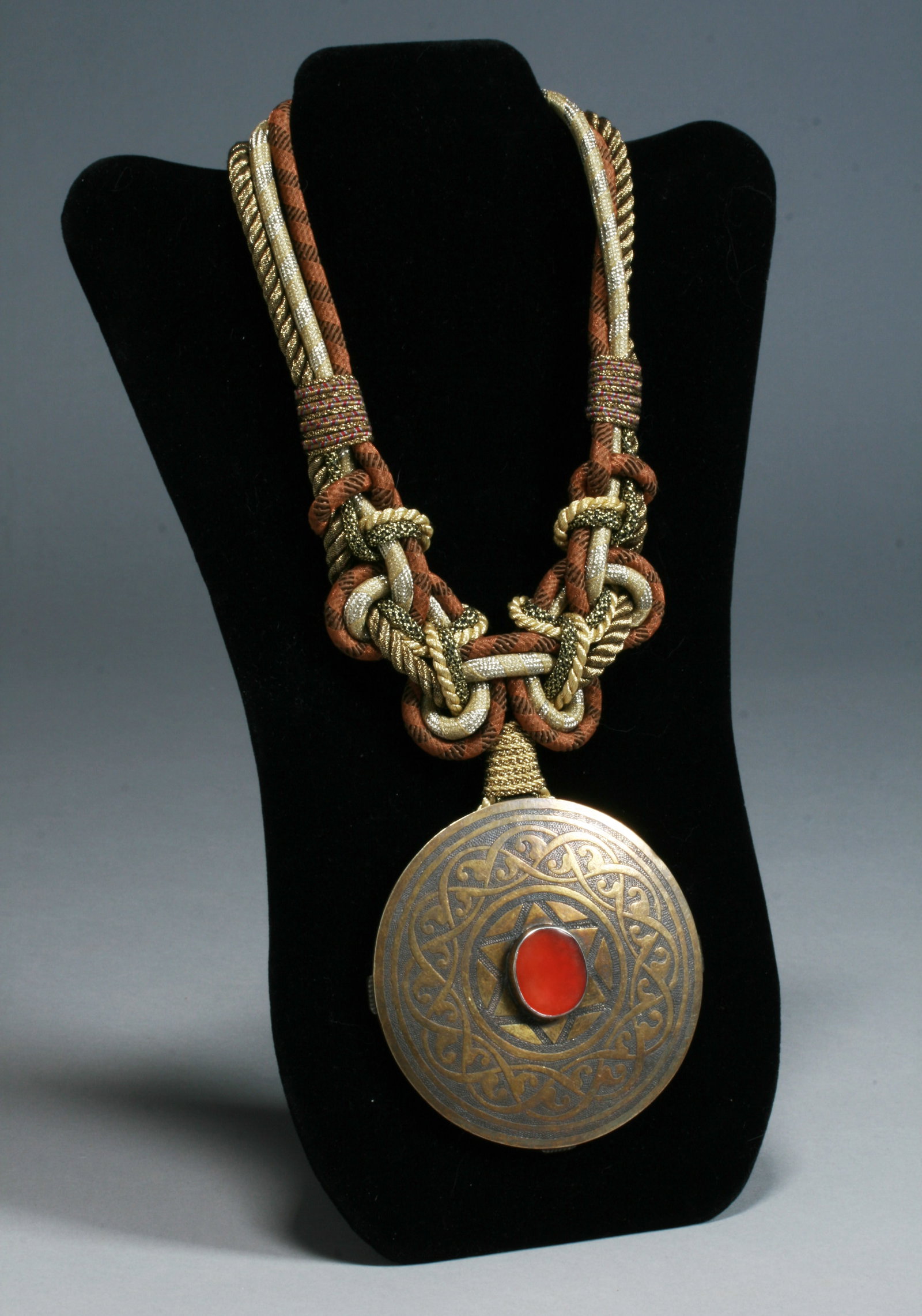 Alex & Lee 'Peace & Love' Art Necklace - 1970's - #1: Fine vintage handmade necklace by Alex & Lee. Circa 1970's. From a New York City, Upper East Side estate collection. This necklace features a woven cord necklace with a large antique Morrocan engraved