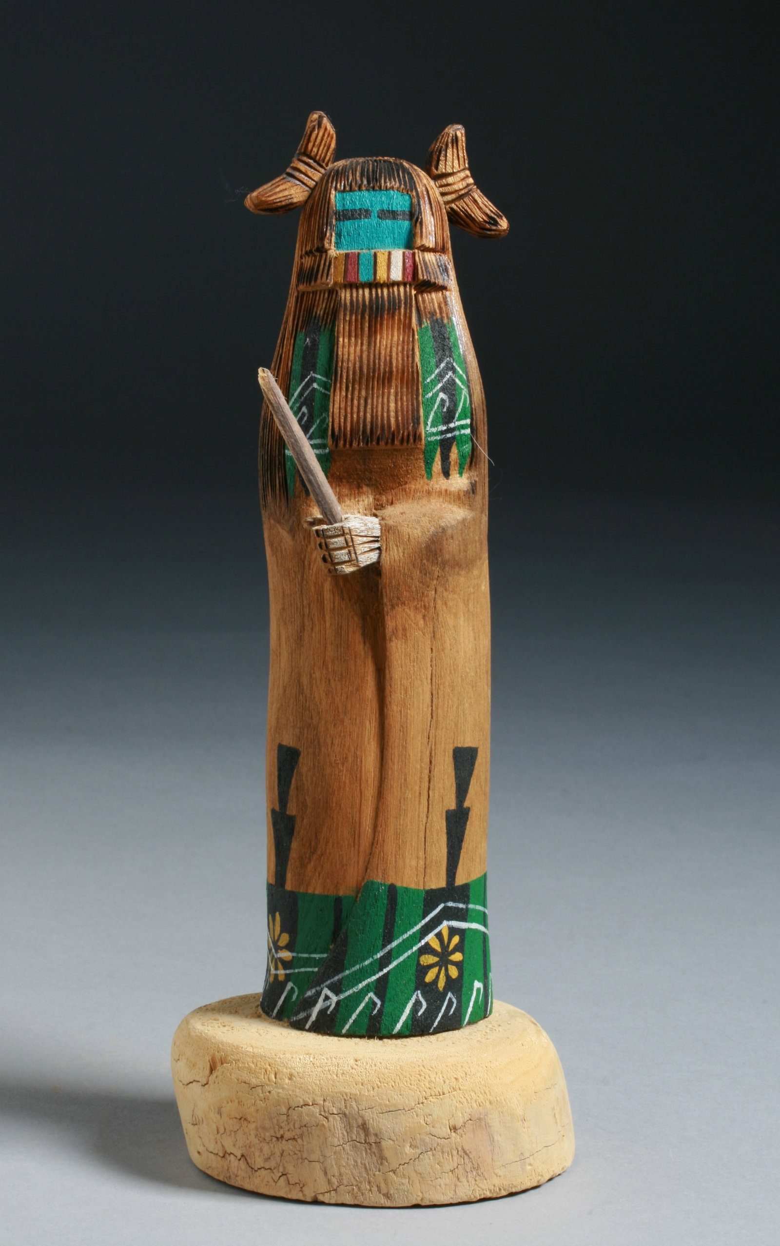 Native American Kachina Doll by Sammie Walker: Hopi Kachina doll by well-known Navajo - Hopi artist, Sammie Walker. Late 20th century. Carved and painted wood. Signed on the bottom, by the artist, and titled "Hemis Mana". Label lightly taped to th