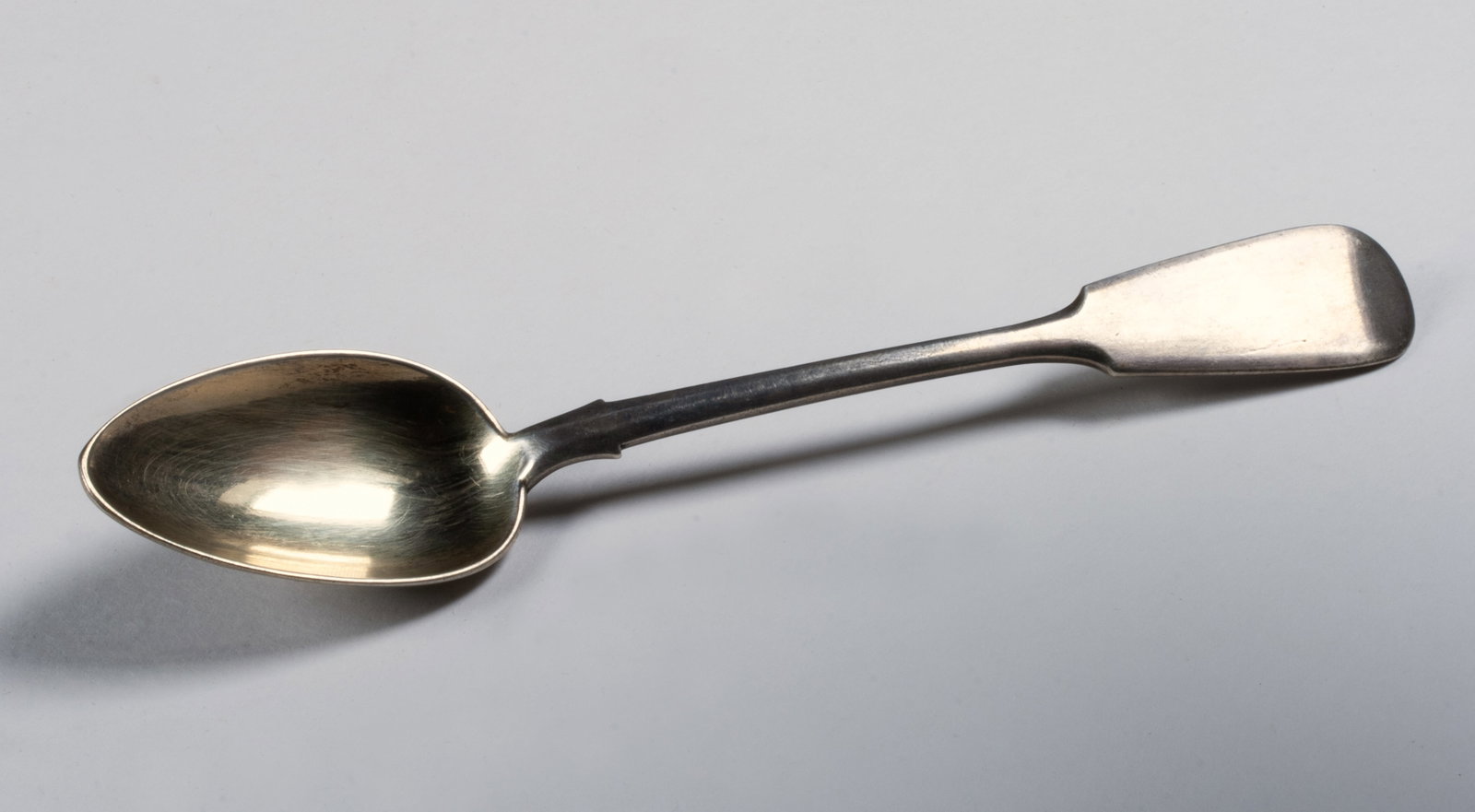 Russian Silver Spoon by Nikolai Pavlov, Moscow 19th Century: Silver teaspoon with a gilding in the bowl, made by Nikolai Pavlov of Moscow. Circa 1890. Marked with a stamped makers hallmark and the "84" on the handle (see photos). Nikolai Pavlov worked in Moscow