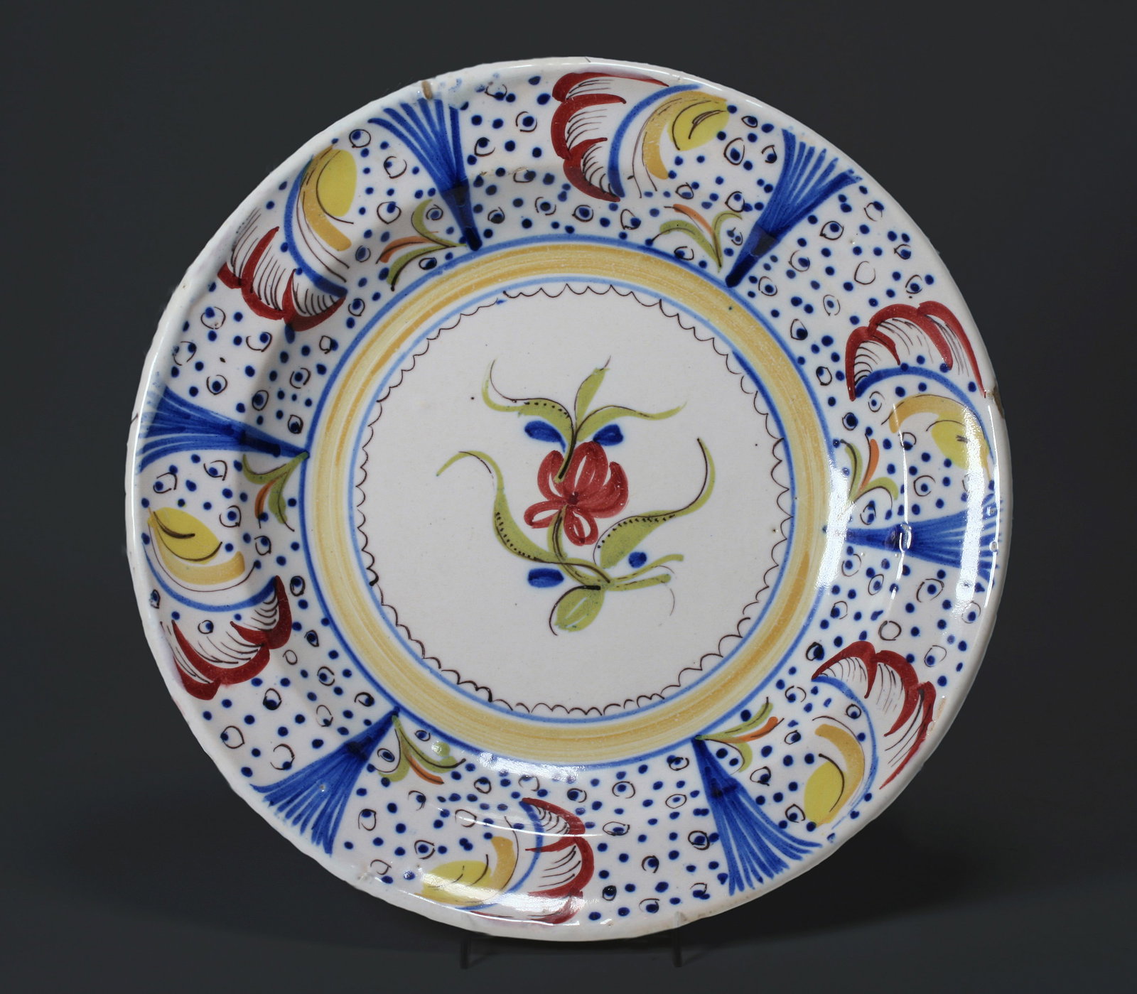 Continental European Faience Pottery Charger - Signed: Large antique faience tin-glazed hand-painted pottery charger. Continental 19th Century. Signed on the back in cobalt blue, as shown. Circa 1820 - 1870's. Painted with floral designs in dark red, eggp