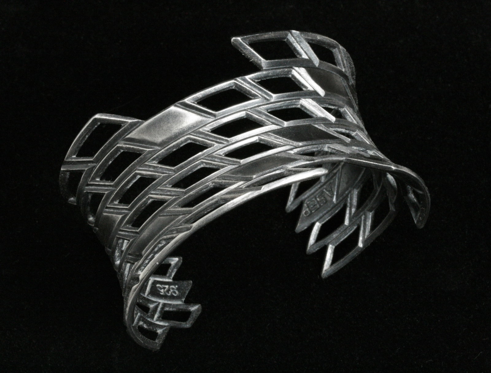 Sterling Modernist Bracelet by ASEP Designs - Native American: A modernist sterling bracelet by ASEP Designs - Adrian Standing-Elk Pinnecoose of New Mexico. An attractive Native American piece, marked on the back ASEP and 925. Adrian Standing-Elk Pinnecoose is a 