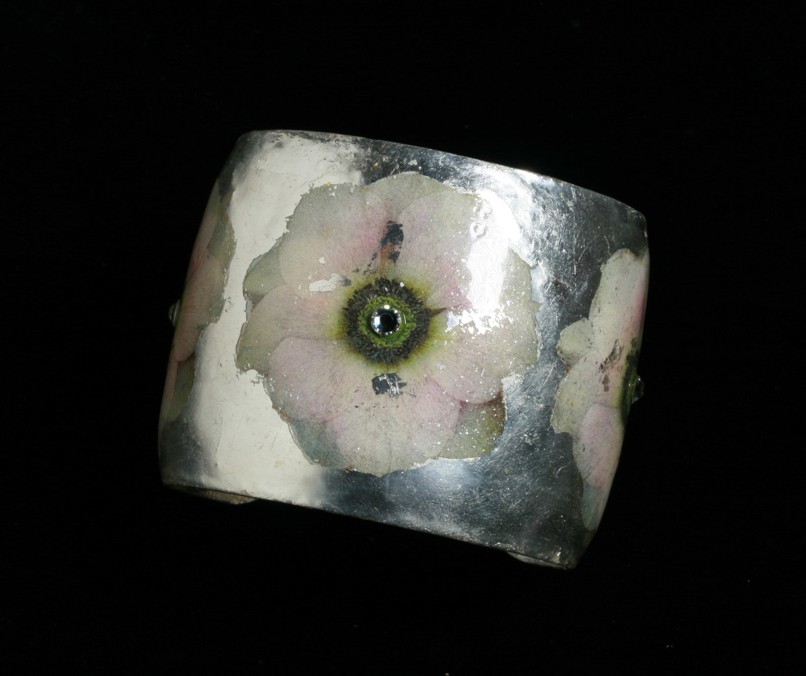 Wild Rose Designer Bracelet by Evocateur: A vintage designer cuff bracelet, handmade by Evocateur. Featuring an elegant floral design of three pink flowers, each with a rhinestone center. Signed EVOCATEUR on the underside. Wrist size - 6" Wid