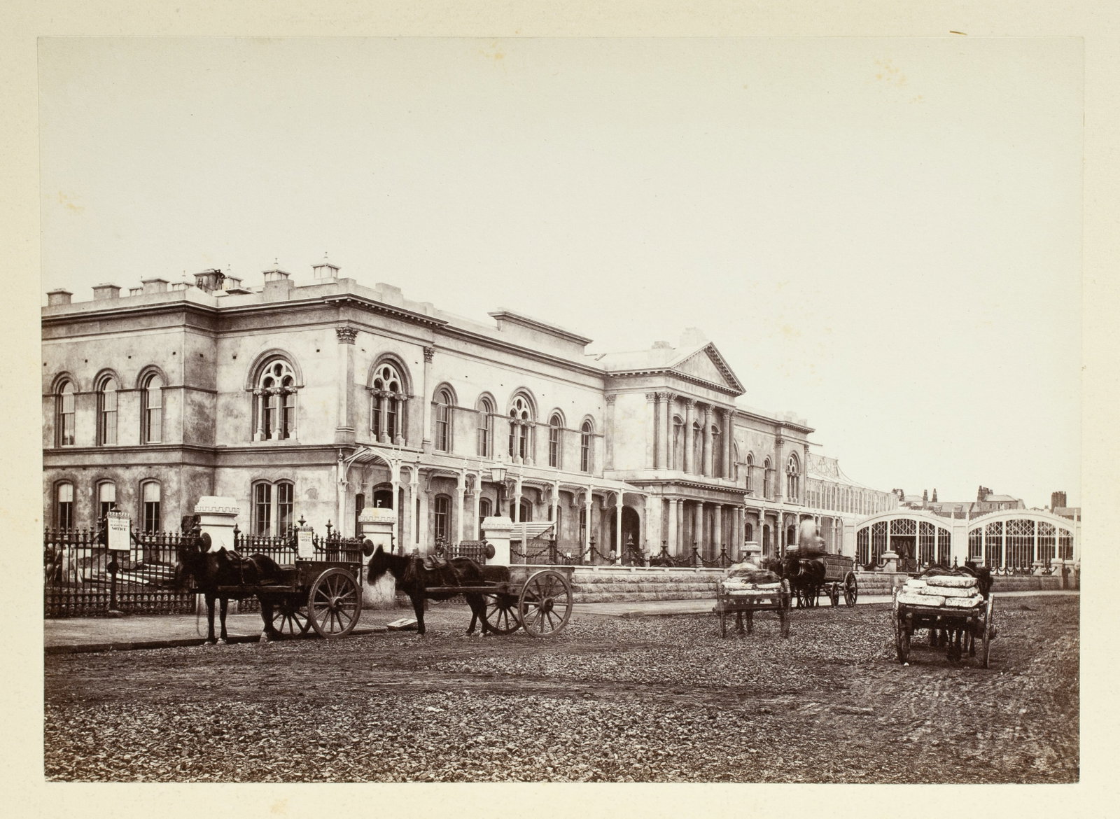 Early Irish Albumen Photograph - International Exhibition 1865: Original albumen photograph of the Winter Garden Exhibition Palace in Dublin, Ireland. Circa 1865. Albumen photograph mounted on card. Unframed. Titled in pen on the reverse and with a name, possibly 