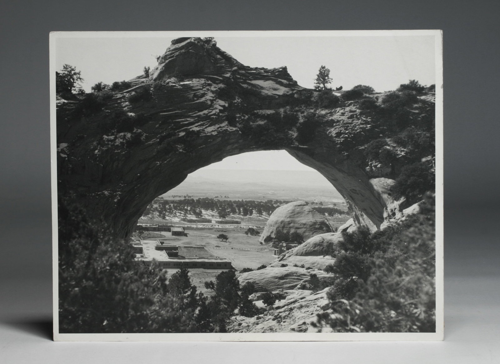"Window Rock, Arizona" WPA Silver Gelatin Photograph- Navajo Reservation 1936: Original large format WPA photograph of "Window Rock, Arizona". Taken in Eastern Arizona on the Navajo Reservation. With the Window Rock arch in the foreground and adobe ranch buildings and Bureau of 