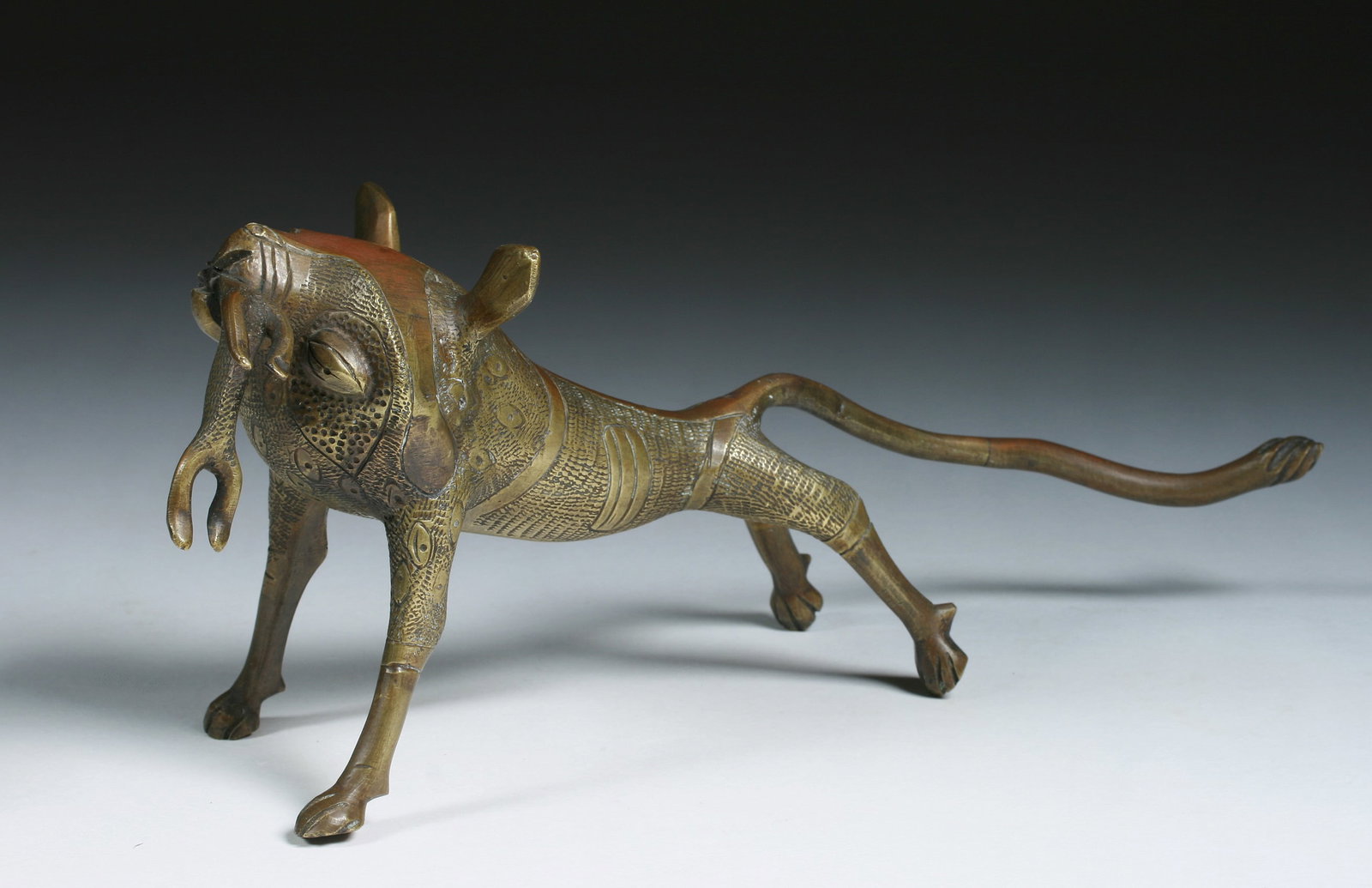 African Benin - Fon Bronze Lion Sculpture - 20th Century: Fine old Benin cast and tooled brass sculpture of a Lion catching a Goat. Fon Culture. Lost wax cast brass. Early 20th century - circa 1920 - 1940. Benin, Africa. This sculpture is more detailed than 
