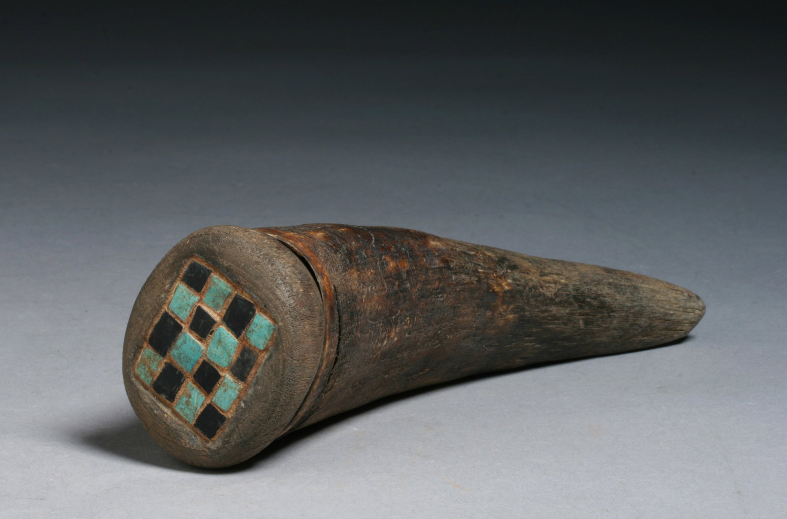 Old Pueblo Zuni - Hopi Medicine or Powder Horn - Native American: An old Pueblo medicine or powder horn with an inlaid wooden top of turquoise and jet. 19th or early 20th century. The top fits perfectly onto the old steer horn and the square checkerboard pattern inl