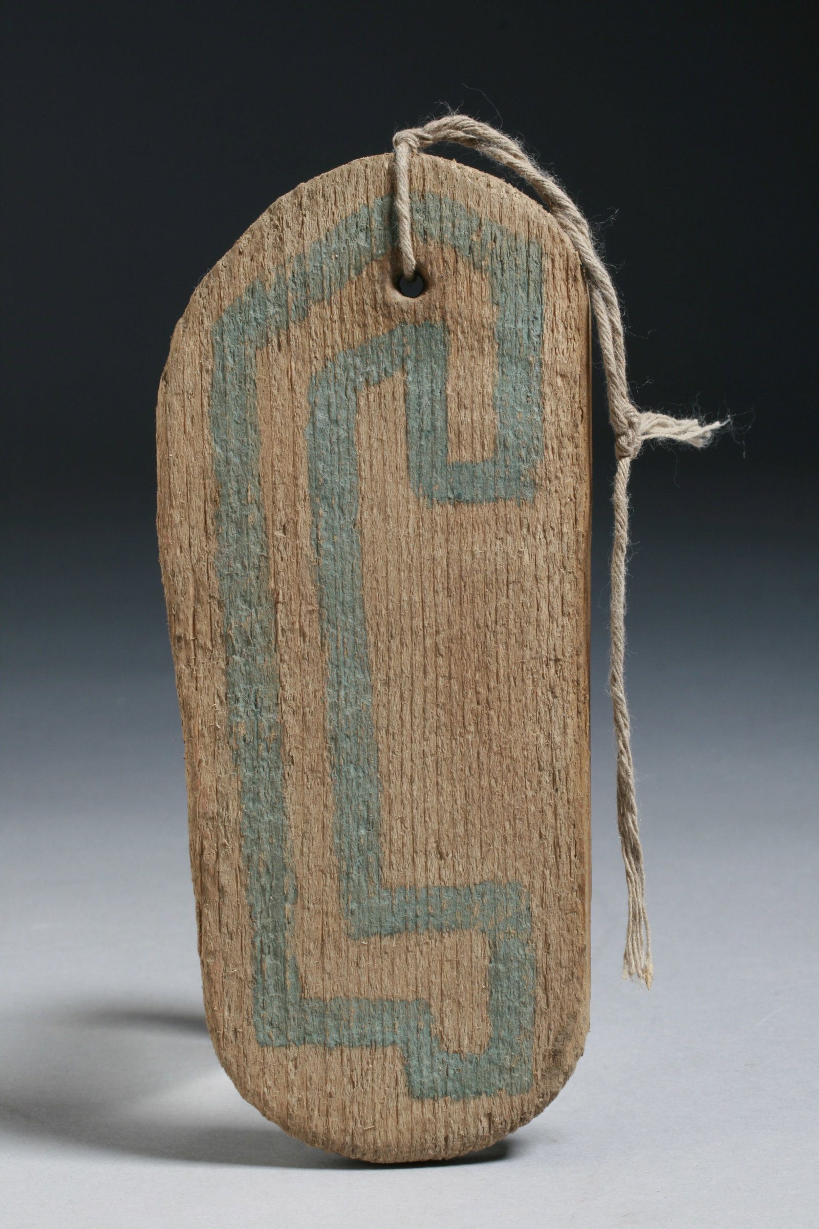 Hopi Pueblo Painted Wood Effigy - Native American: An old Hopi painted wood effigy object in the shape of a moccasin. Collected at First Mesa. Early 20th century. The painted line on it is a map of the outer path around a mesa / pueblo. Made for Hopi 