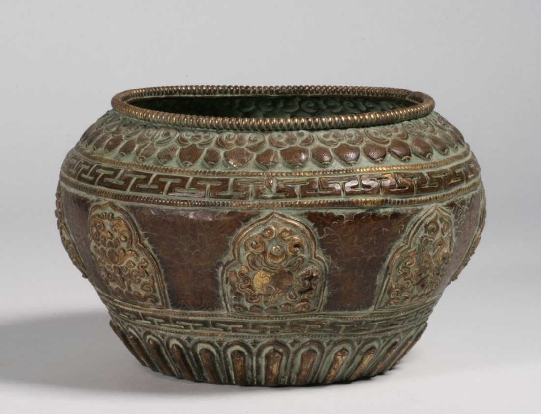 Chinese Sino-Tibetan Carved Repousse Bronze Bowl: Antique Chinese - Tibetan carved and repousse bronze or brass bowl. 19th - early 20th century. Beautifully detailed traditional Buddhist decoration featuring a beaded top rim, geometric designs, engra