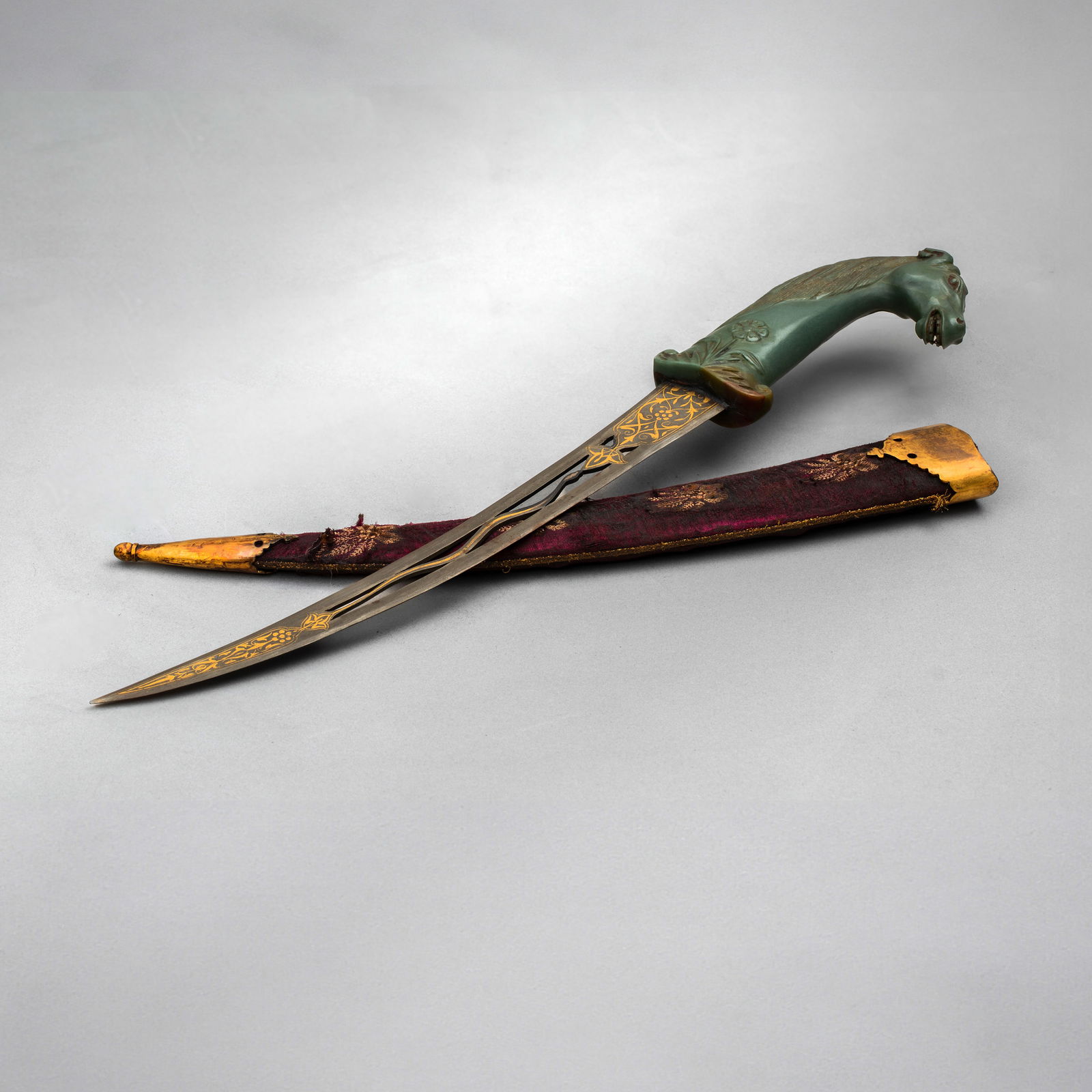 A MUGHAL STYLE HORSE-HEADED STONE HILTED PIERCED AND GILDED BLADE DAGGER (KHANJAR) WITH SHEATH (1 of 1)