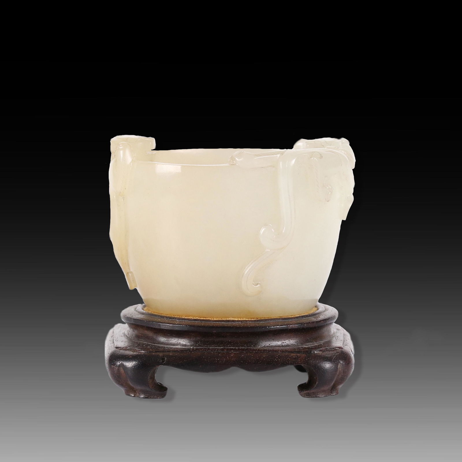 A CHINESE WHITE JADE CUP WITH WOOD STAND. (1 of 11)