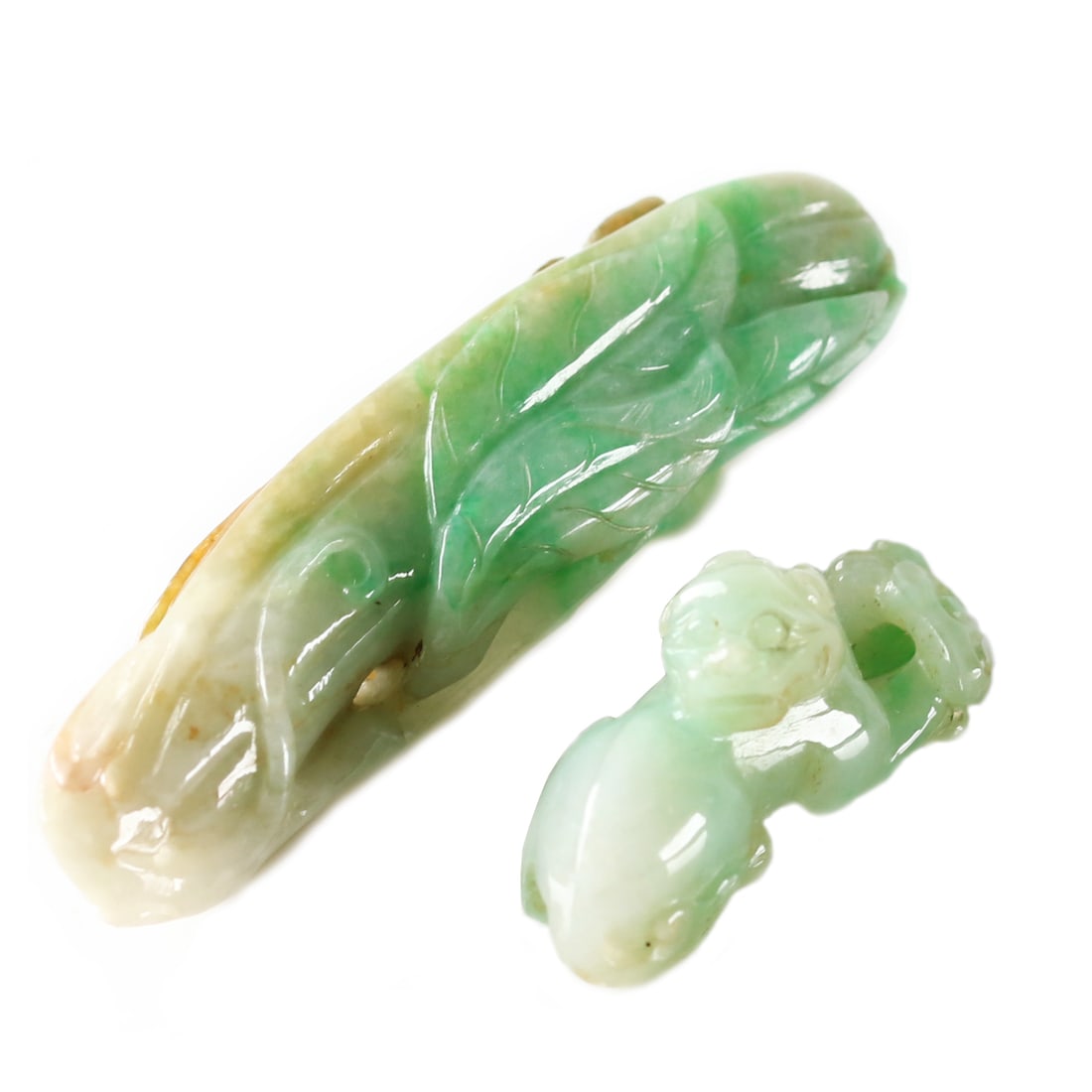 Chinese Jadeite Carved Pendants: Length 53 resp 30 mm.
