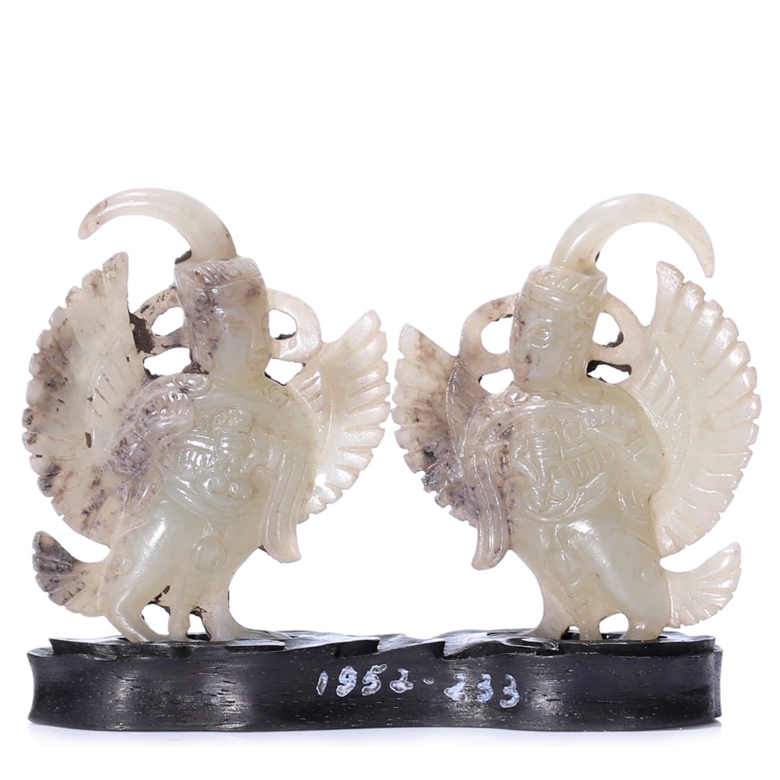 A Pair Of Chinese White Jade Carved Immortal Sculptures With Stand: 34 x 44 mm, height including accessories 50 mm.