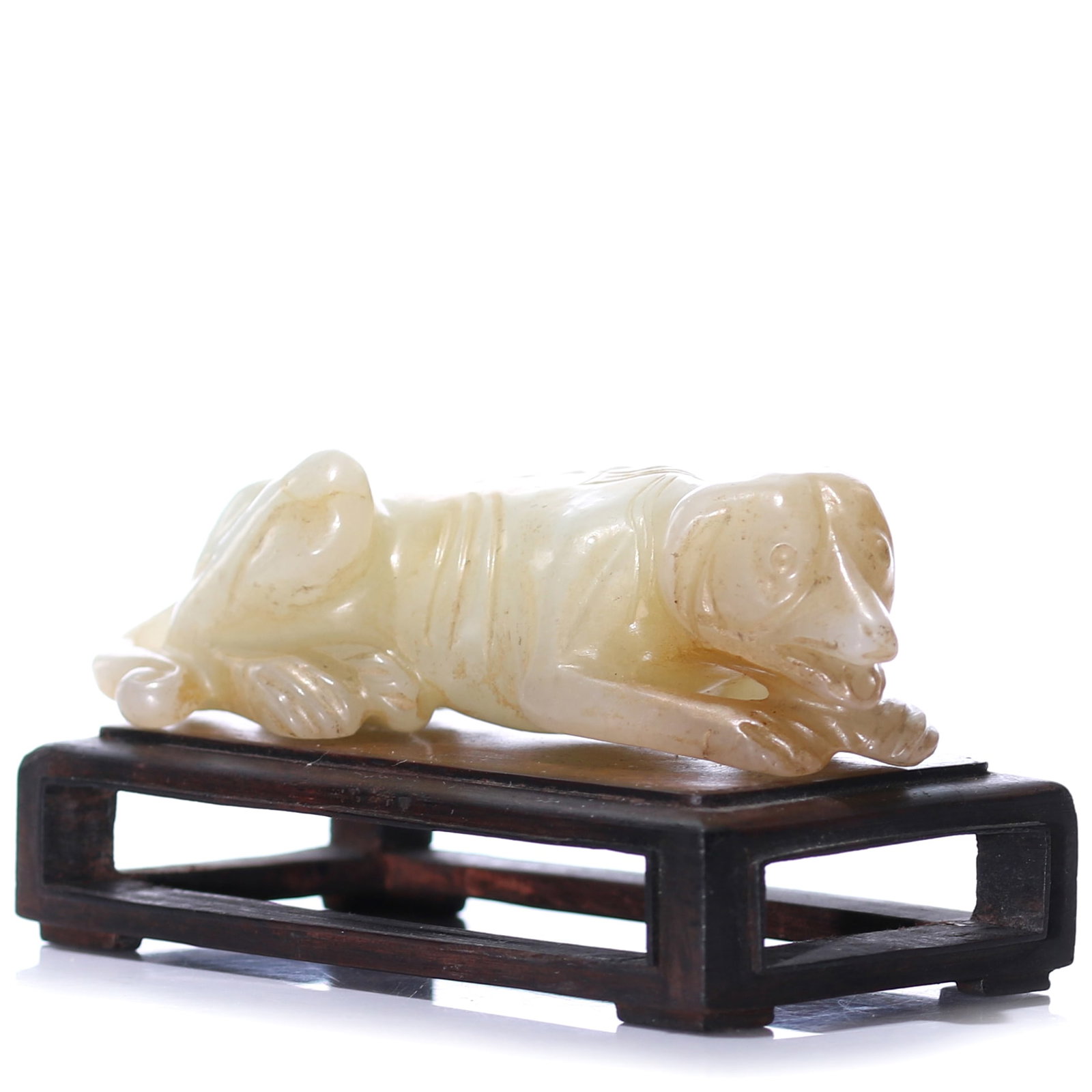 A Chinese White Jade Carved Dog Statue With Stand: 87 x 23 x 30 mm, height including accessories 40 mm.