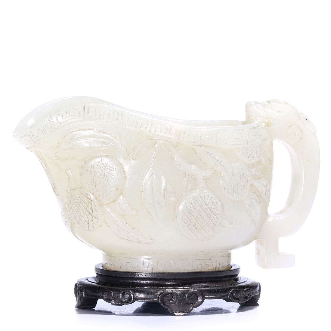 A Chinese White Jade Carved Cup With Stand: 12 x 6 x 6.5 cm, height including accessories 8 cm.