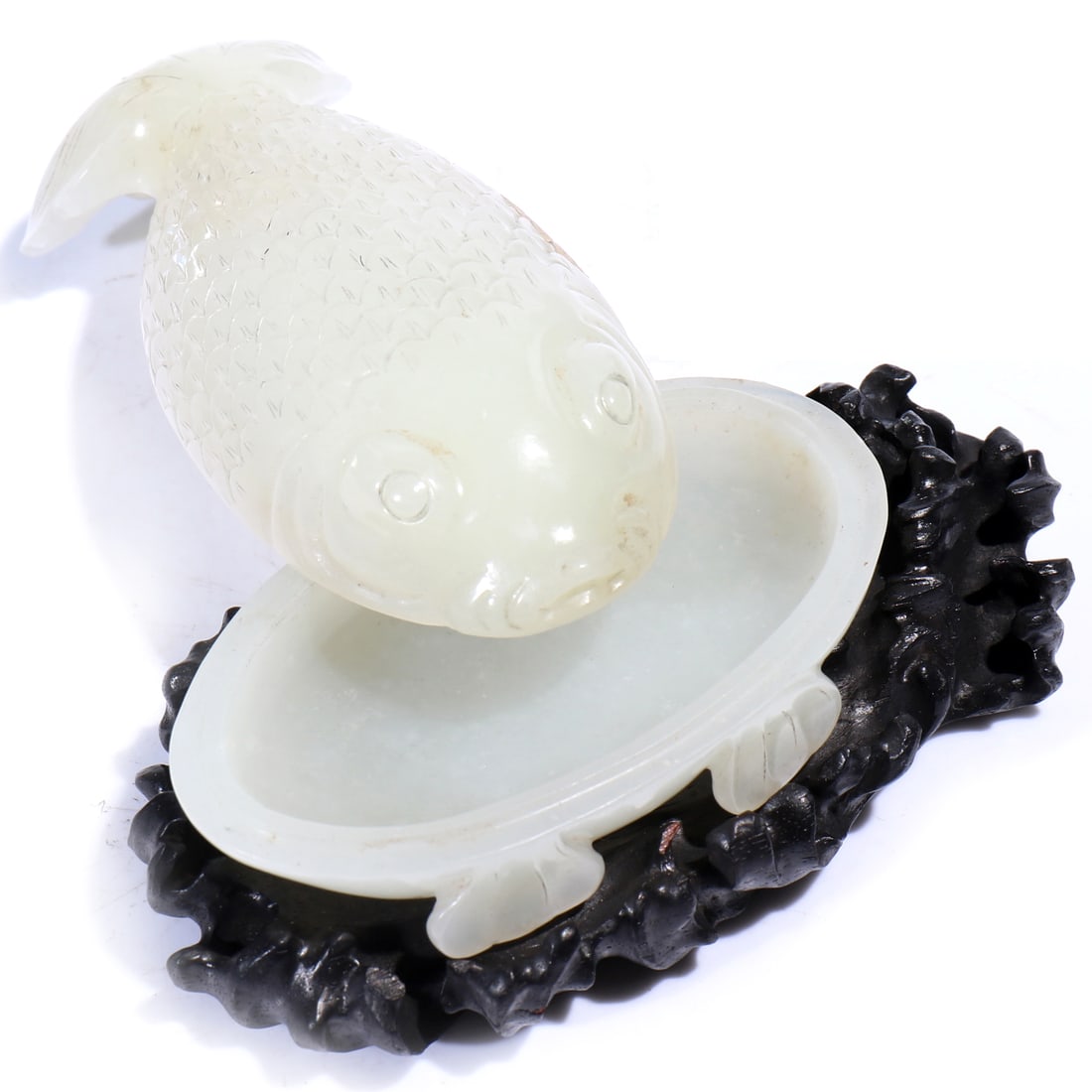 A Chinese White Jade Carved Fish-Shape Box With Stand: 10 x 4.6 x 3.4 cm, height including accessories 5 cm.
