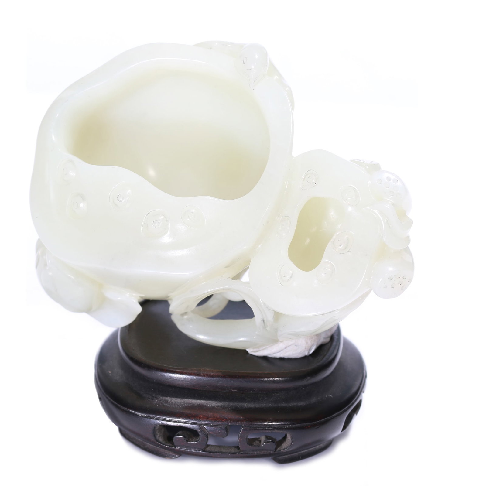 A Chinese White Jade Carved Lotus Ornament With Stand: 8.6 x 6.5 x 4.5 cm, height including accessories 6.3 cm